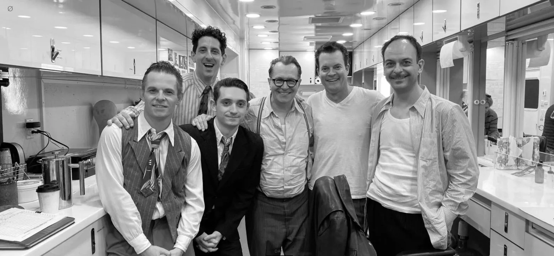 Gary Oldman, John Churchill, Paul Fox, Adam Shapiro, Jack Romano, and Jeff Harms in Mank (2020)