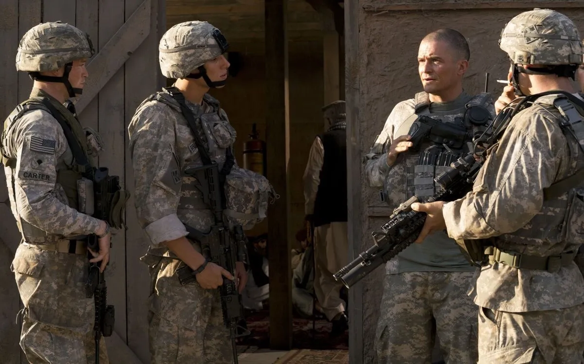 Orlando Bloom and Caleb Landry Jones in The Outpost (2019)