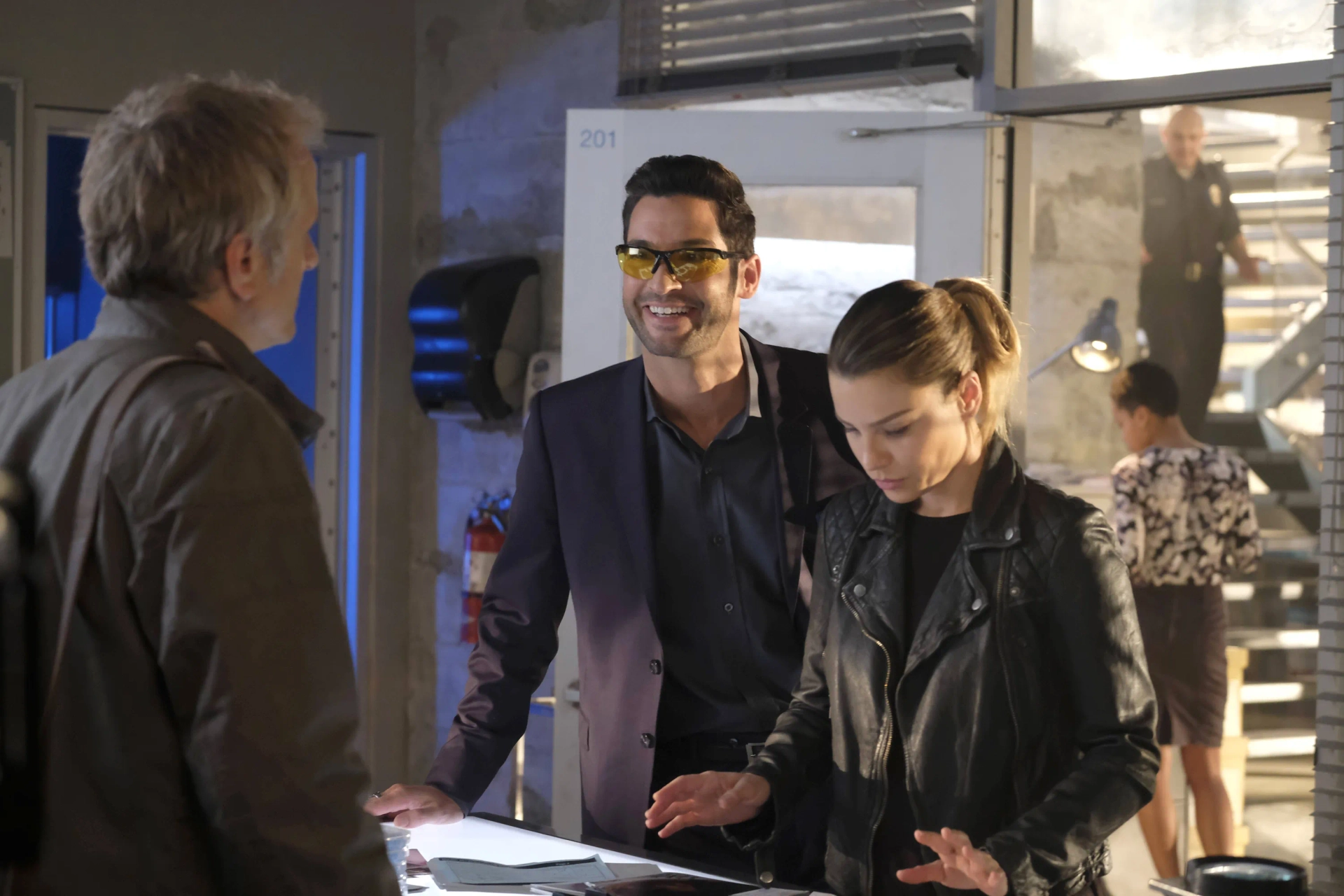 Tom Ellis, Patrick Fabian, and Lauren German in Lucifer (2016)