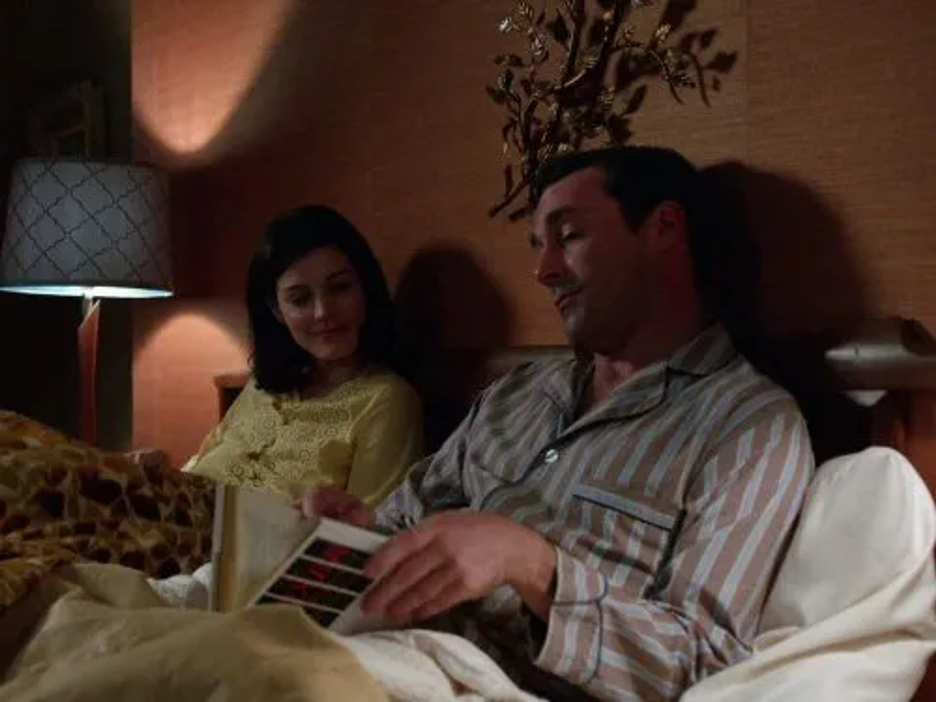 Jon Hamm and Jessica Paré in Mad Men (2007)