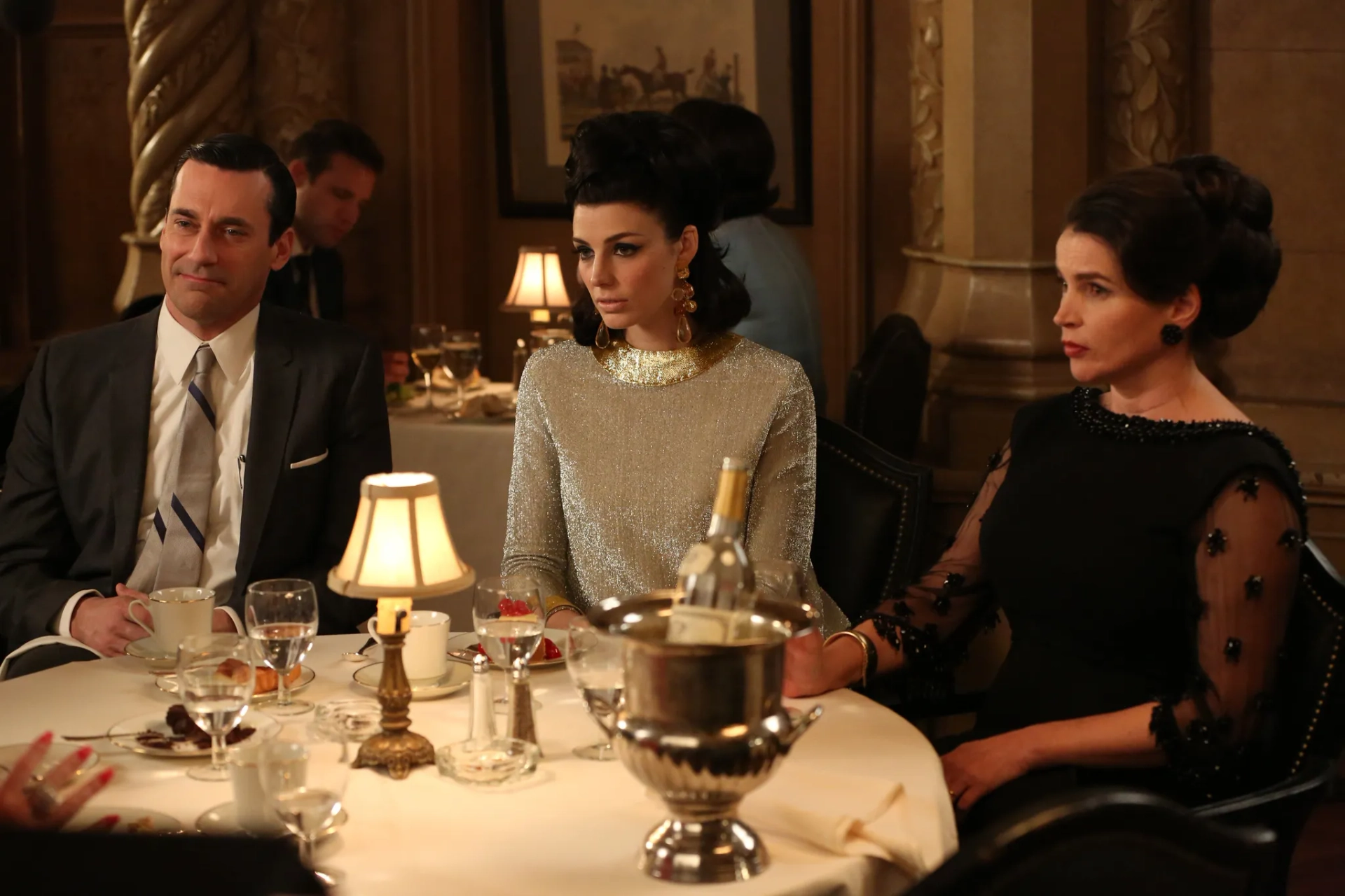 Julia Ormond, Jon Hamm, and Jessica Paré in Mad Men (2007)