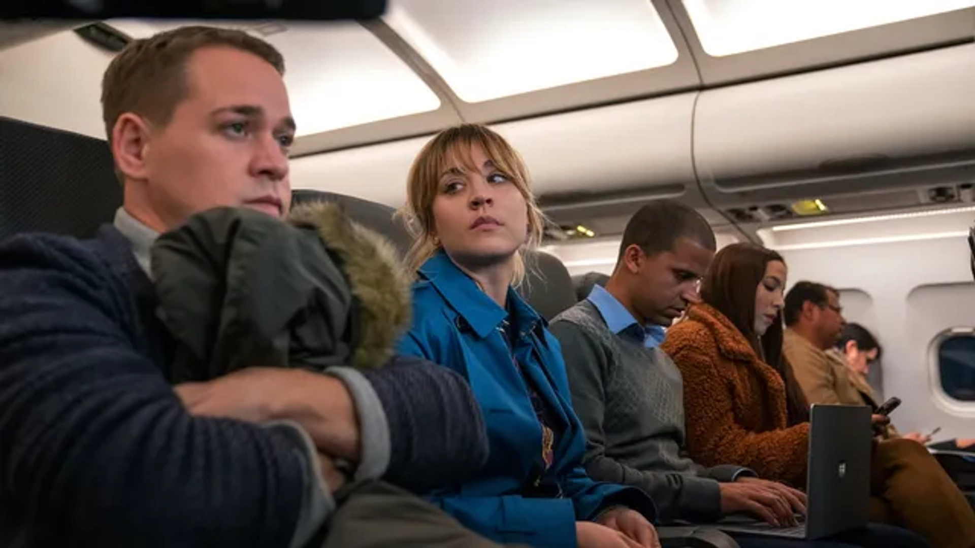 Kaley Cuoco and T.R. Knight in The Flight Attendant: Brothers & Sisters (2022)