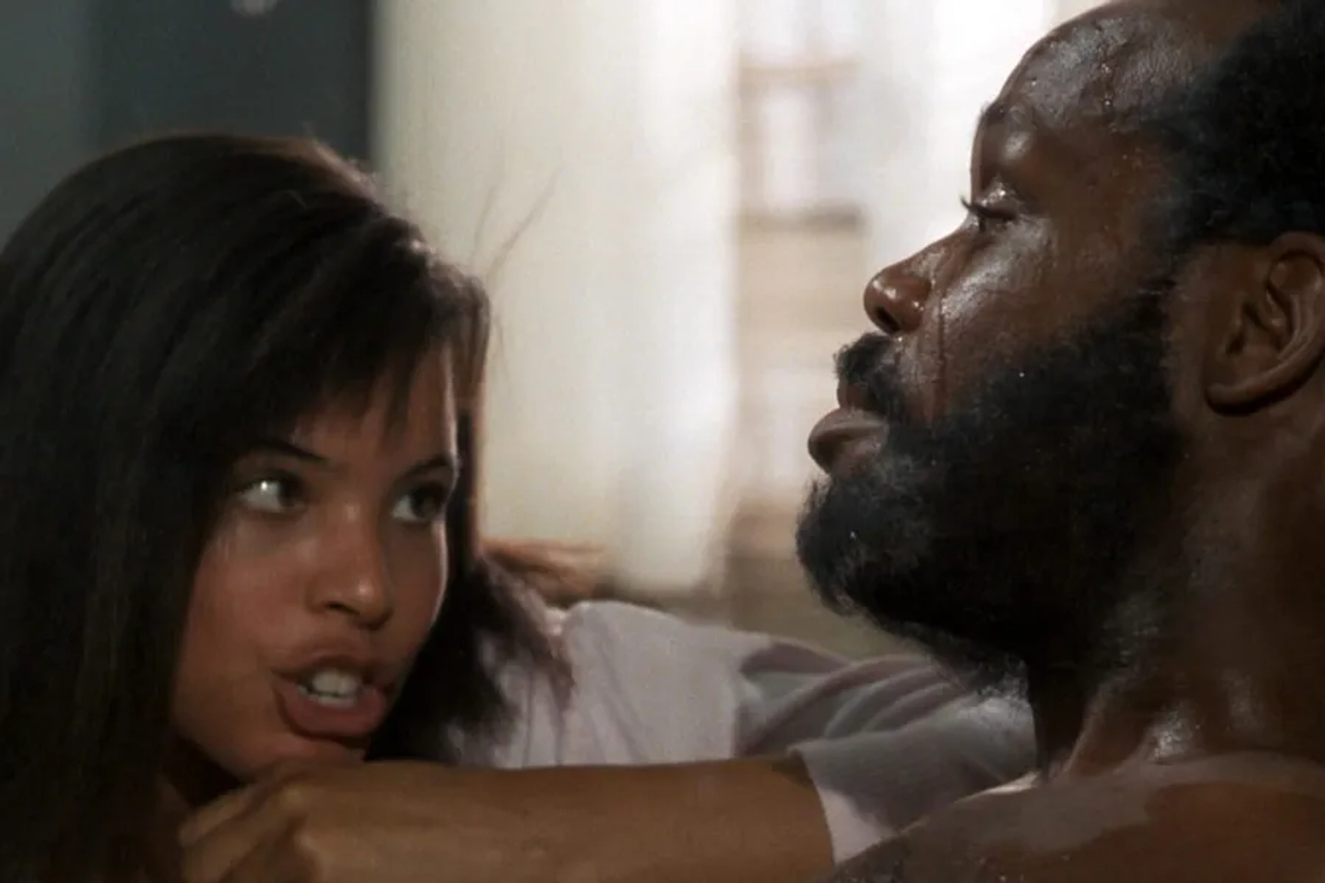 Danny Glover and Traci Wolfe in Lethal Weapon (1987)