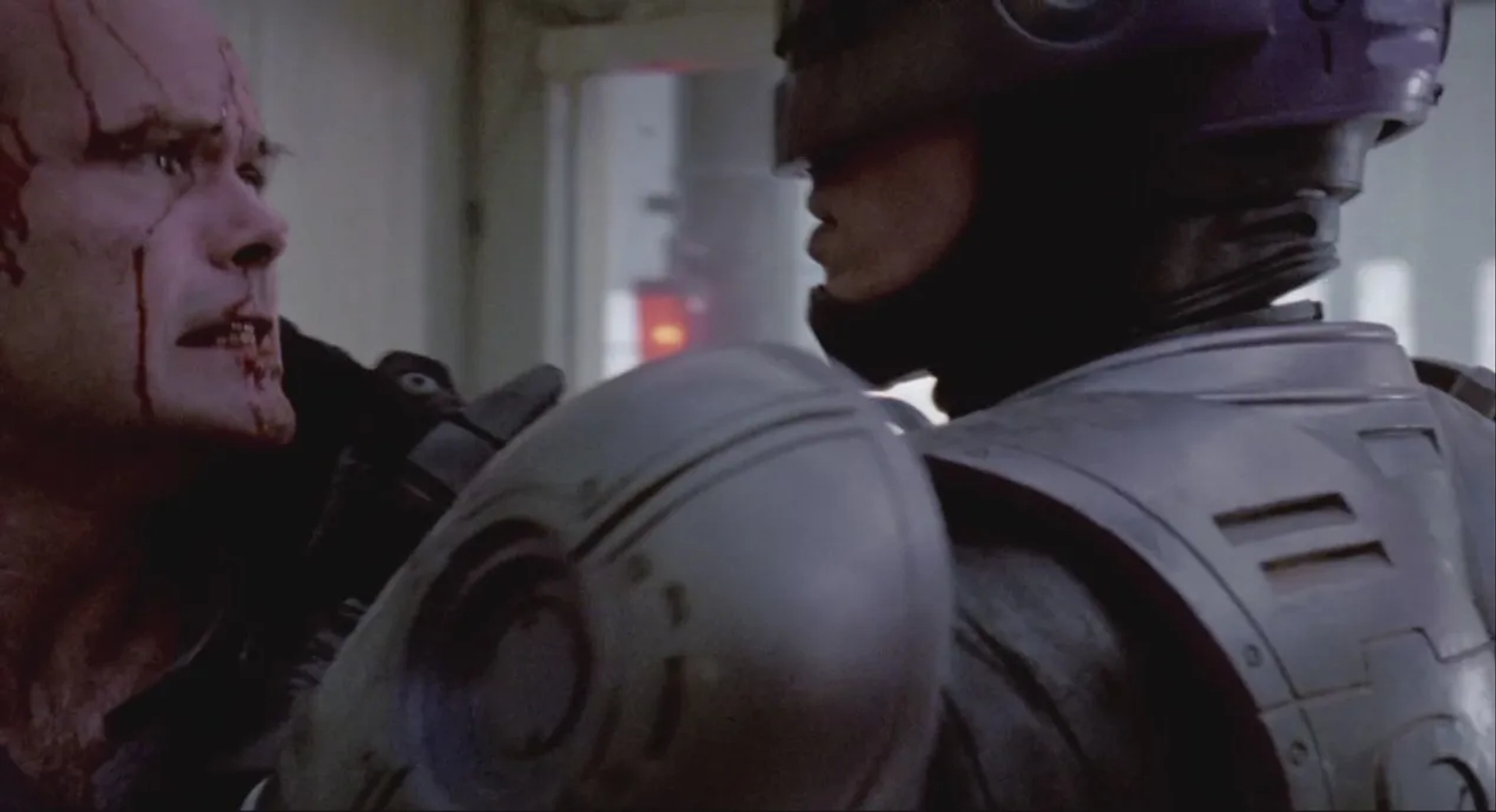 Peter Weller and Kurtwood Smith in RoboCop (1987)