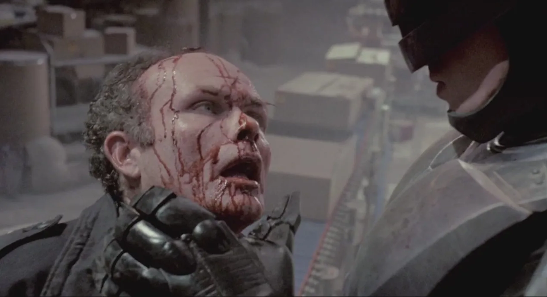 Peter Weller and Kurtwood Smith in RoboCop (1987)