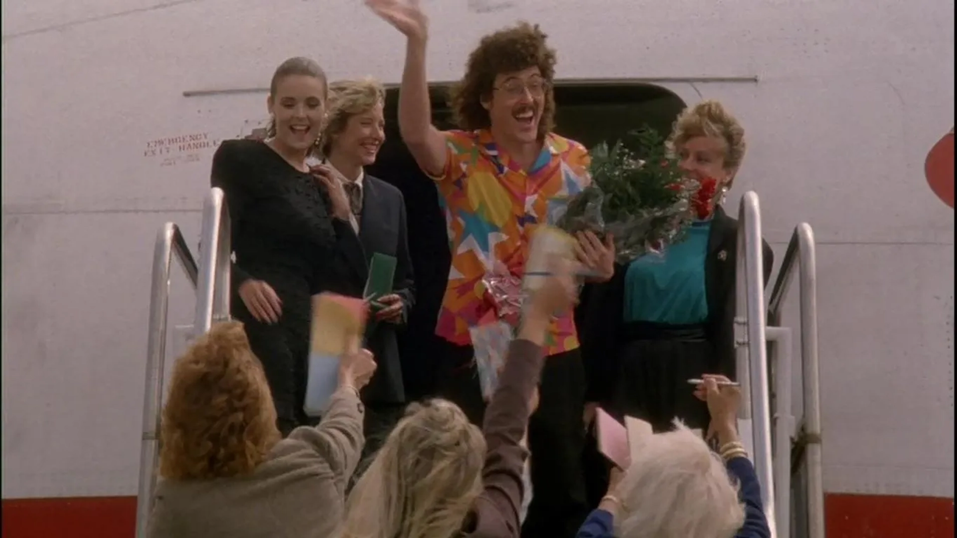 Jacqueline Barrymore, Leslie Maier, and 'Weird Al' Yankovic in The Naked Gun: From the Files of Police Squad! (1988)