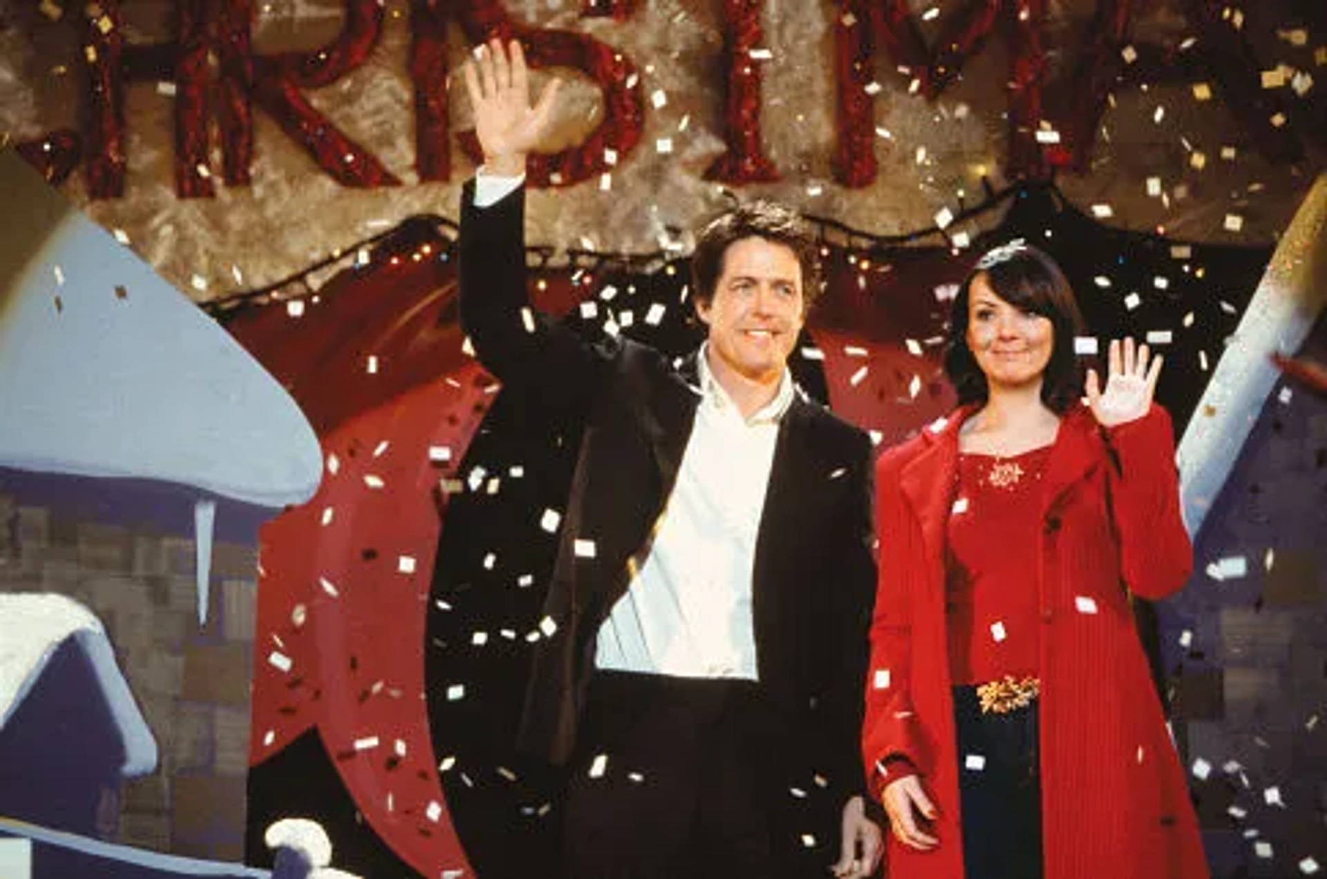 The Prime Minister (HUGH GRANT) and Natalie (MARTINE McCUTCHEON) are caught off-guard (and quite by accident) at a Christmas pageant in Richard Curtis' romantic comedy Love Actually.