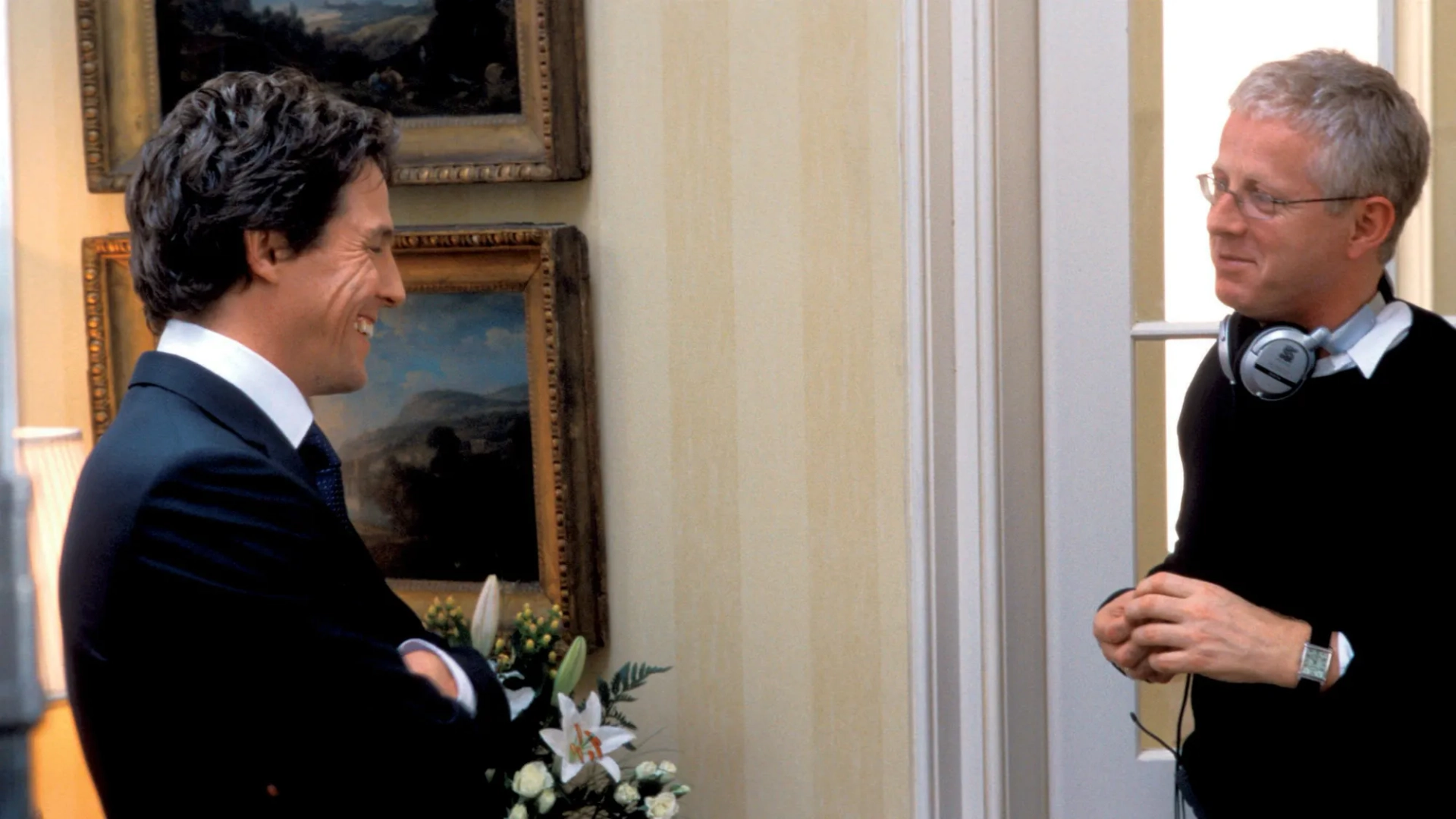 Hugh Grant and Richard Curtis in Love Actually (2003)