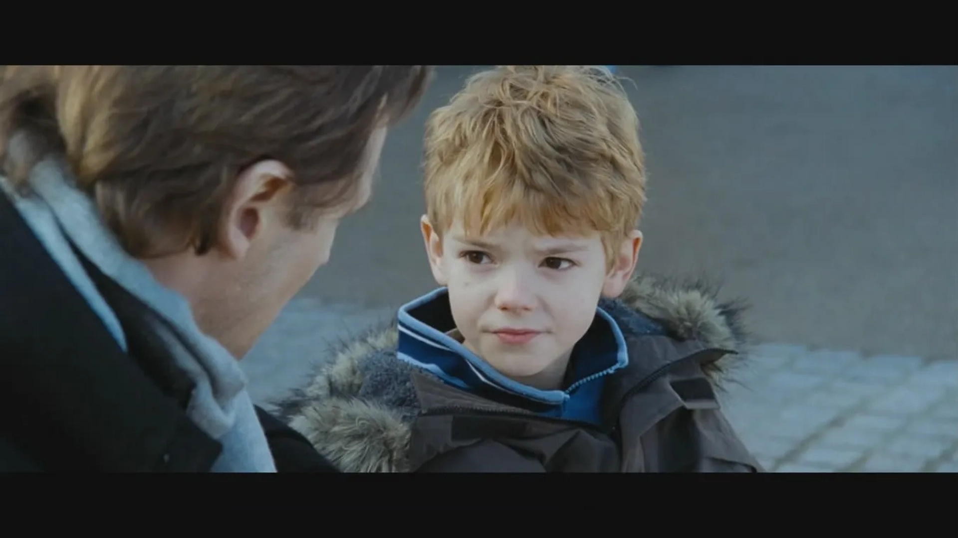 Liam Neeson and Thomas Brodie-Sangster in Love Actually (2003)