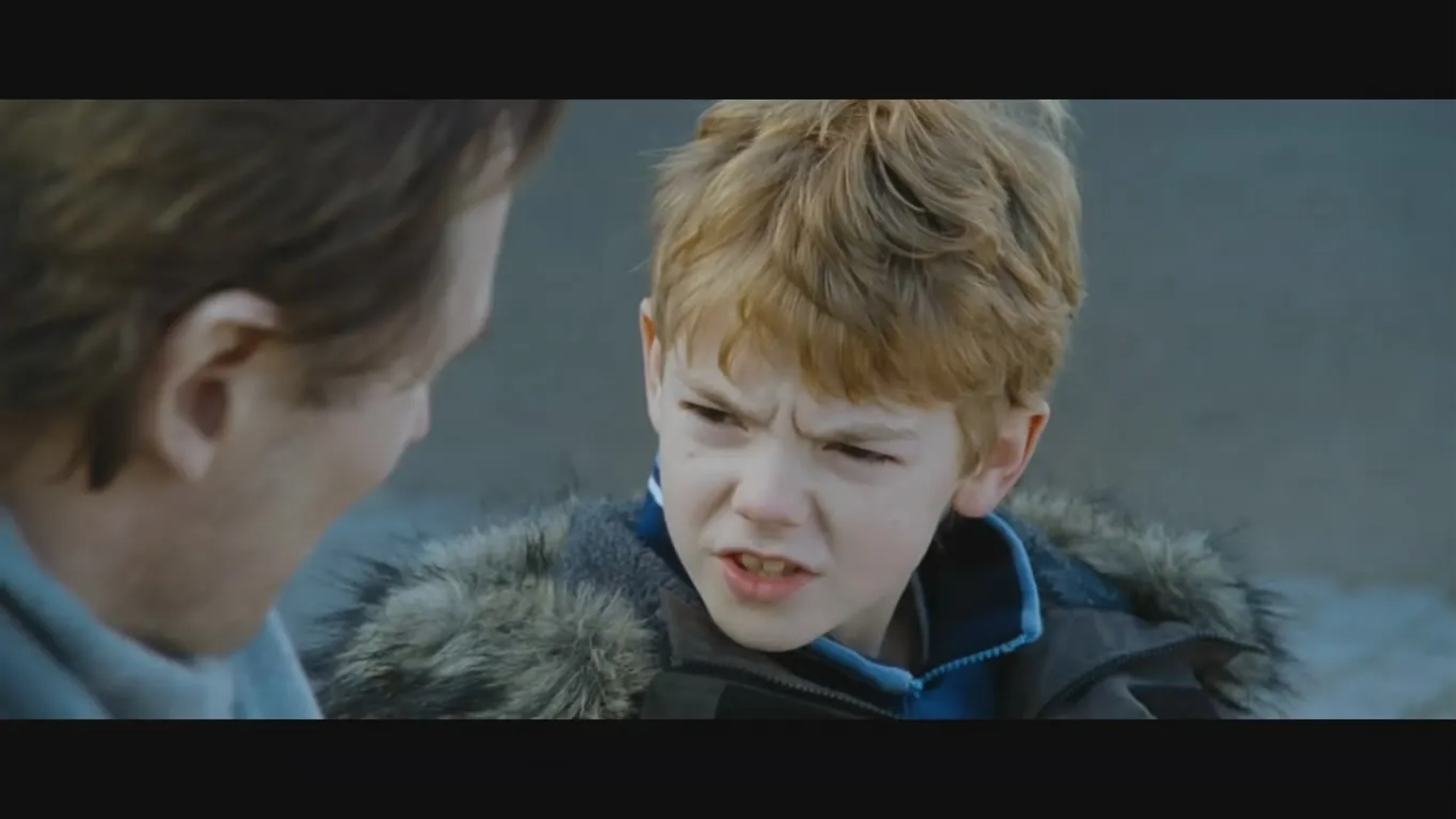 Liam Neeson and Thomas Brodie-Sangster in Love Actually (2003)