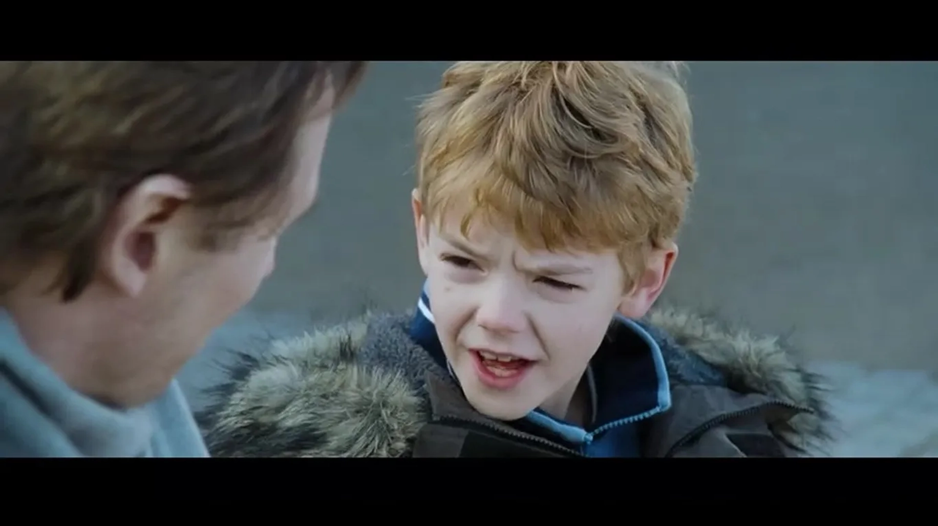 Liam Neeson and Thomas Brodie-Sangster in Love Actually (2003)