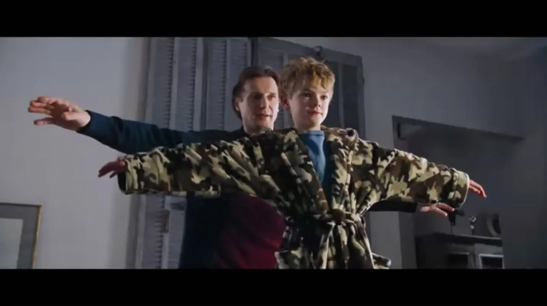 Liam Neeson and Thomas Brodie-Sangster in Love Actually (2003)