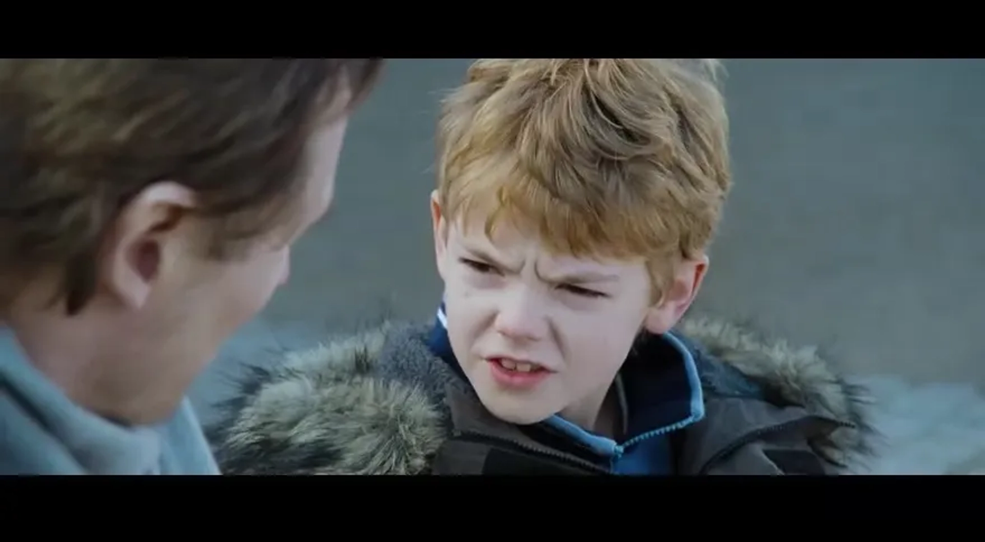 Liam Neeson and Thomas Brodie-Sangster in Love Actually (2003)