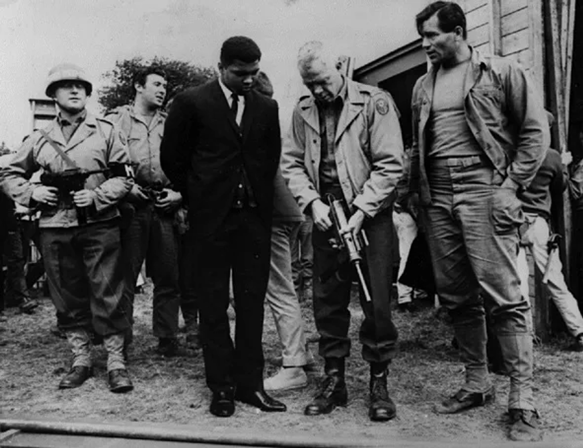 Muhammad Ali, Lee Marvin, and Clint Walker in The Dirty Dozen (1967)