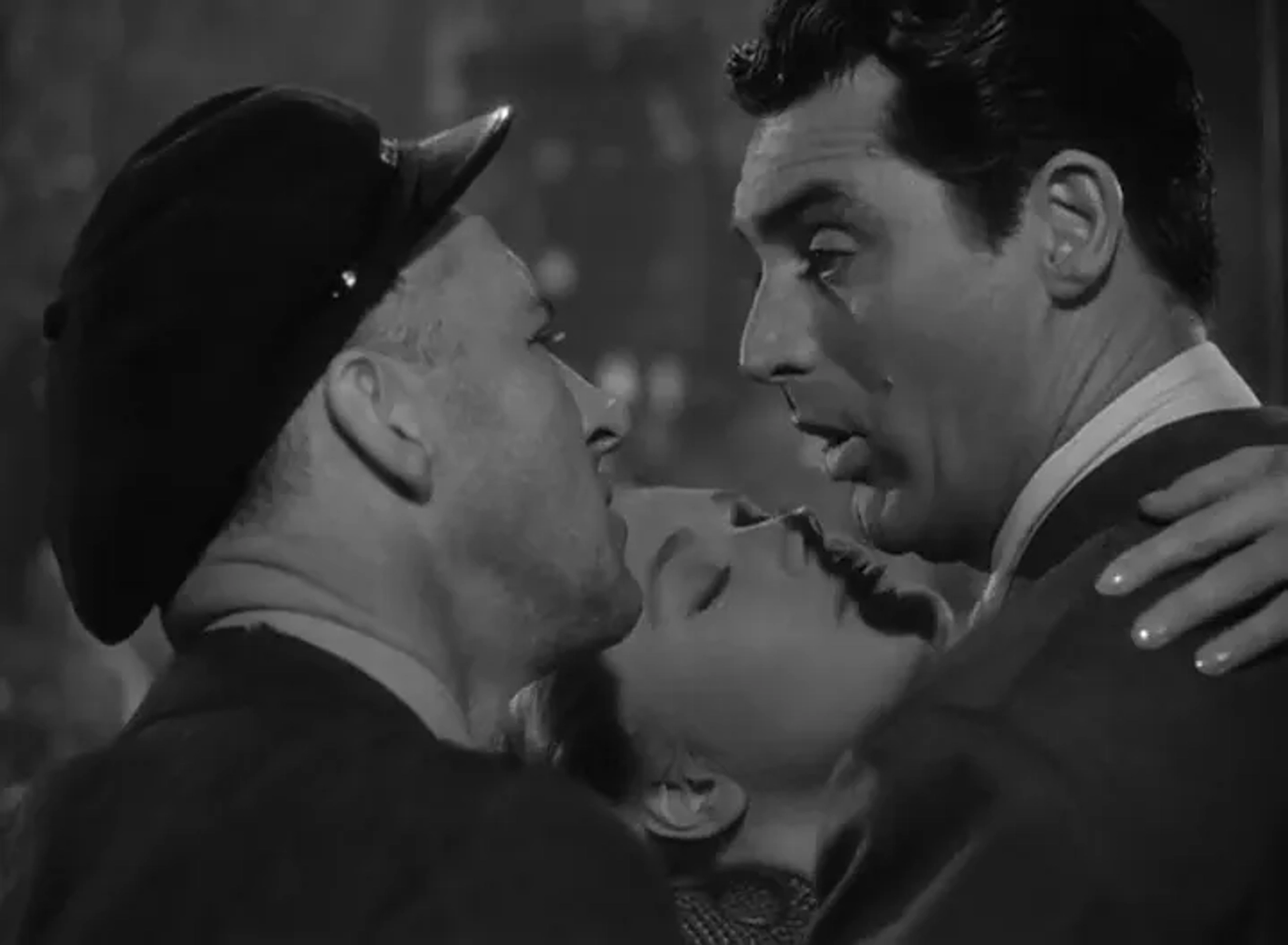 Cary Grant, Priscilla Lane, and Garry Owen in Arsenic and Old Lace (1944)