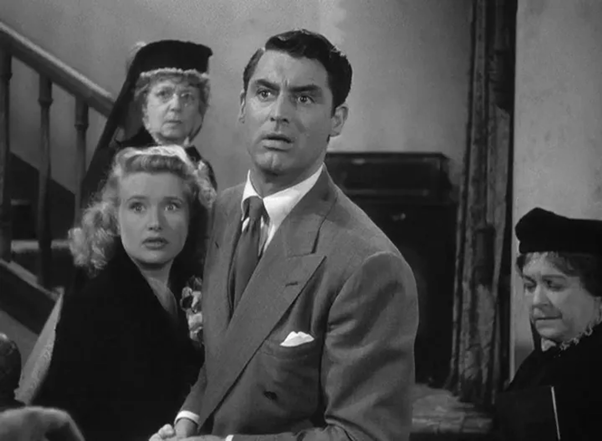 Cary Grant, Jean Adair, Josephine Hull, and Priscilla Lane in Arsenic and Old Lace (1944)