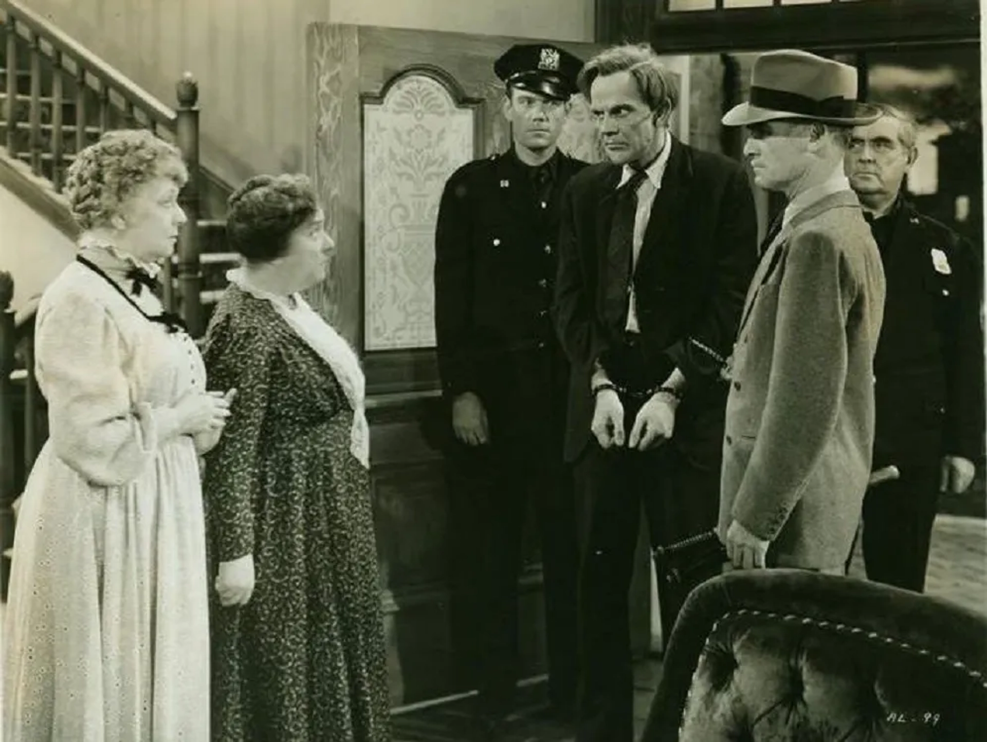 Jean Adair, James Gleason, Josephine Hull, Raymond Massey, Edward McNamara, and John Ridgely in Arsenic and Old Lace (1944)