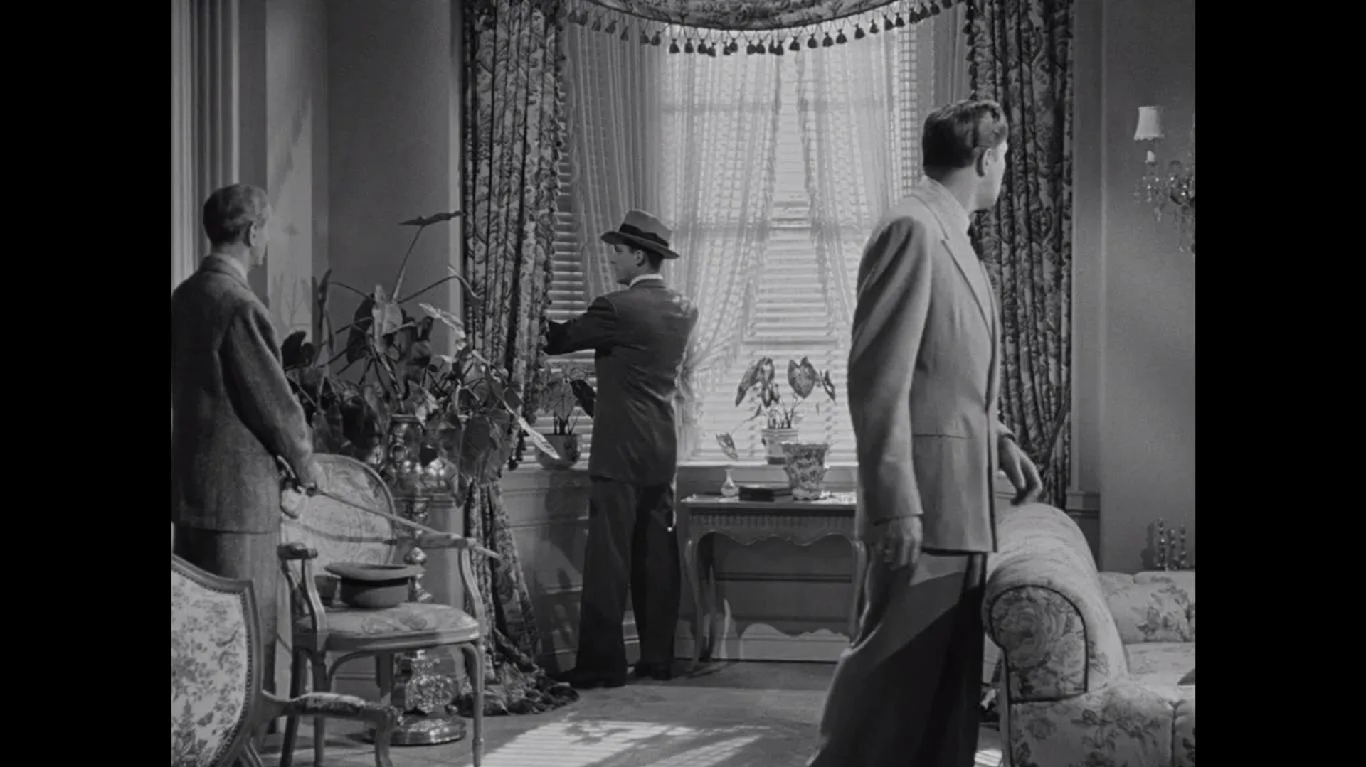 Dana Andrews, Vincent Price, and Clifton Webb in Laura (1944)