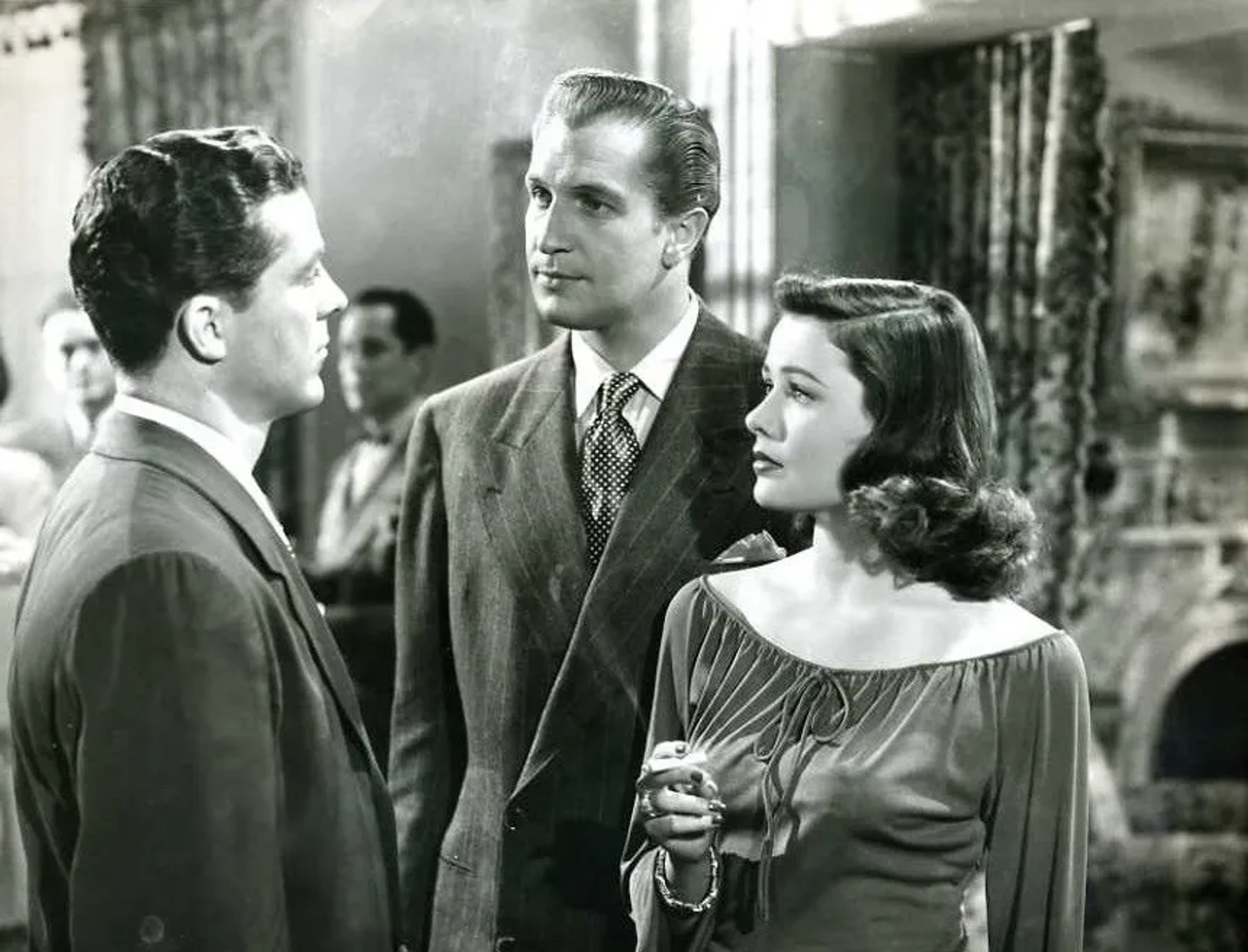 Gene Tierney, Dana Andrews, and Vincent Price in Laura (1944)