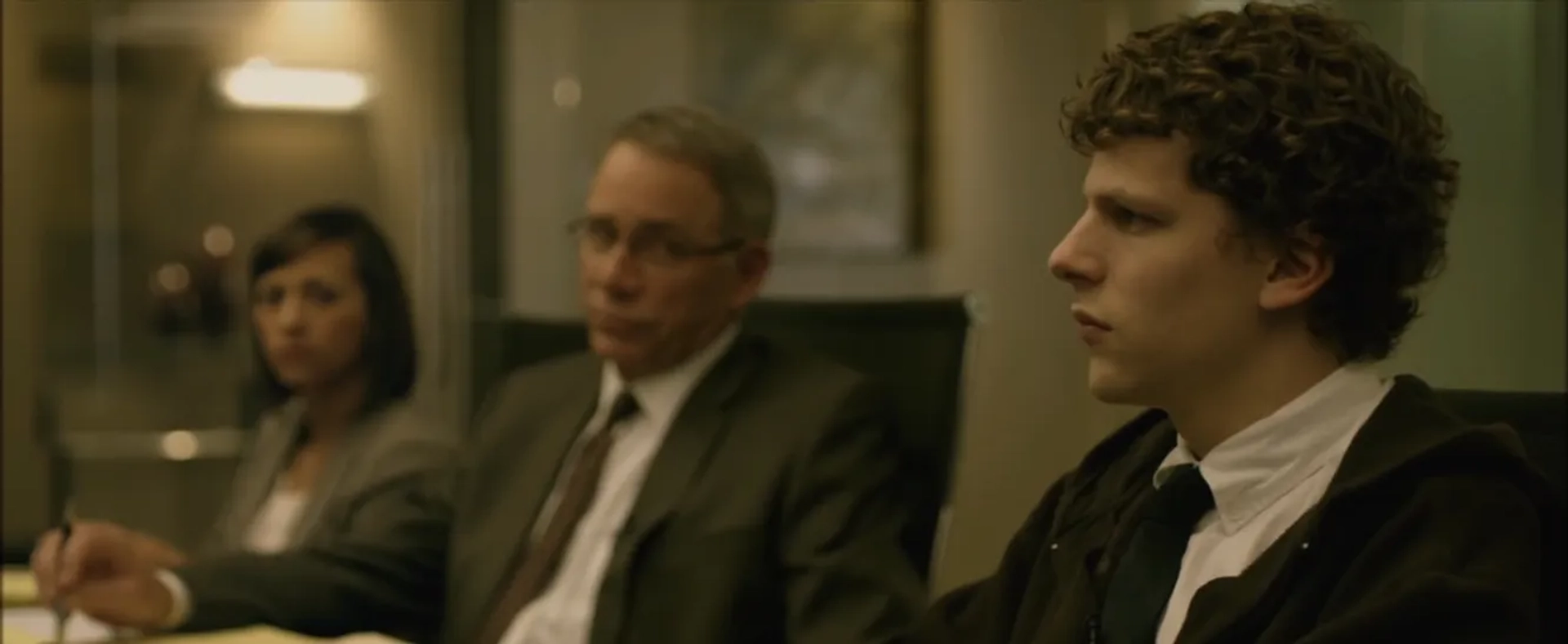 Jesse Eisenberg, John Getz, and Rashida Jones in The Social Network (2010)