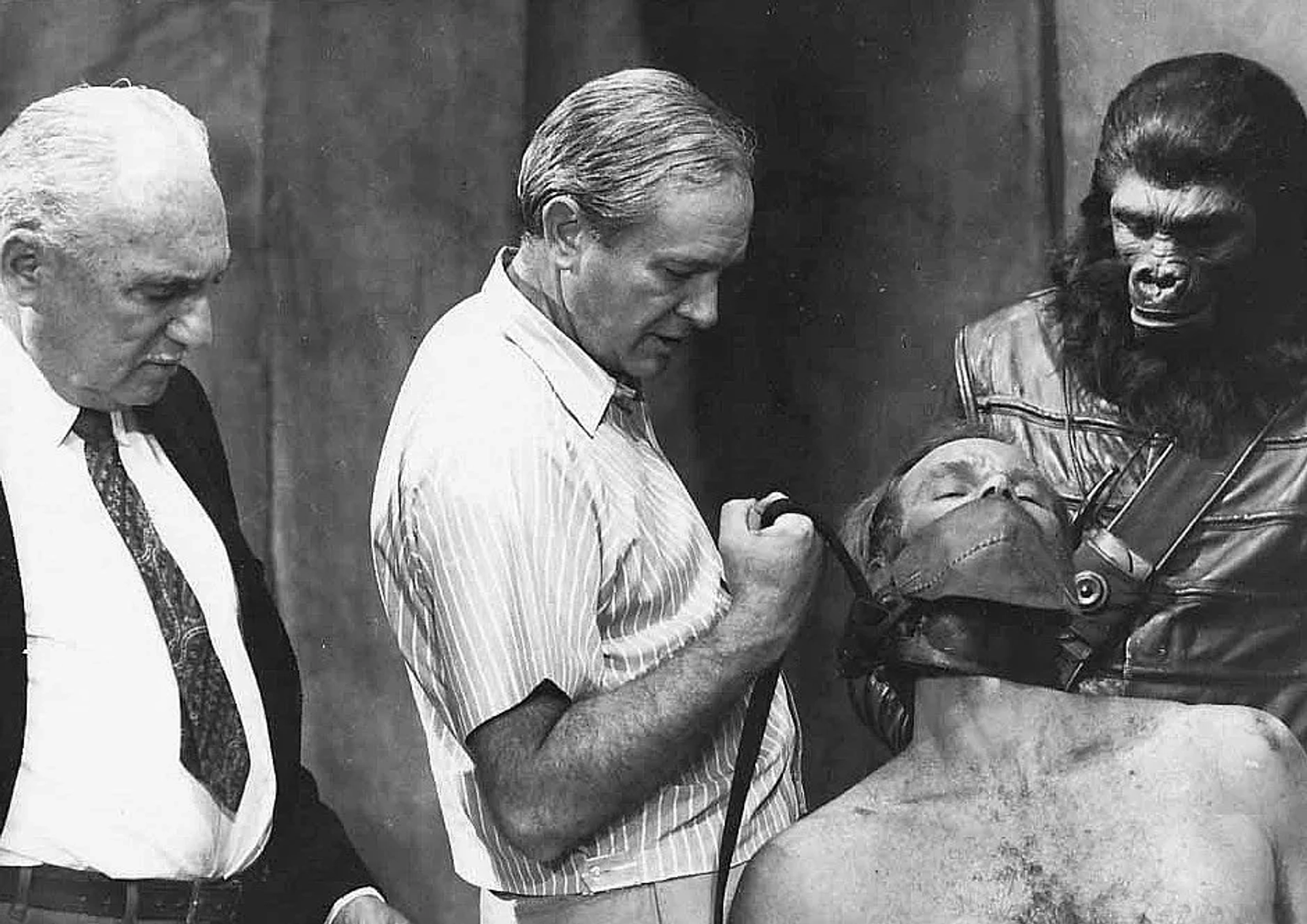 Charlton Heston, Leon Shamroy, Army Archerd, and Franklin J. Schaffner in Planet of the Apes (1968)