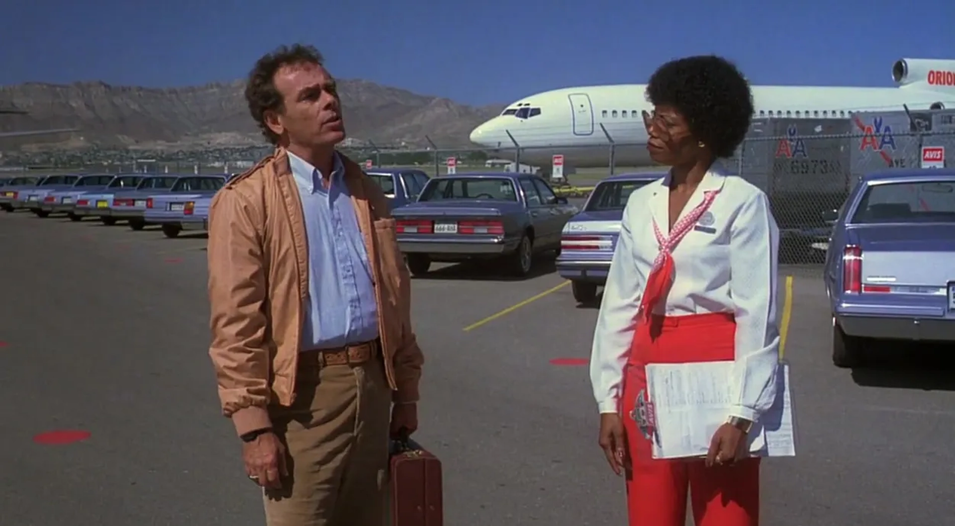 Dean Stockwell and Claresie Mobley in Paris, Texas (1984)