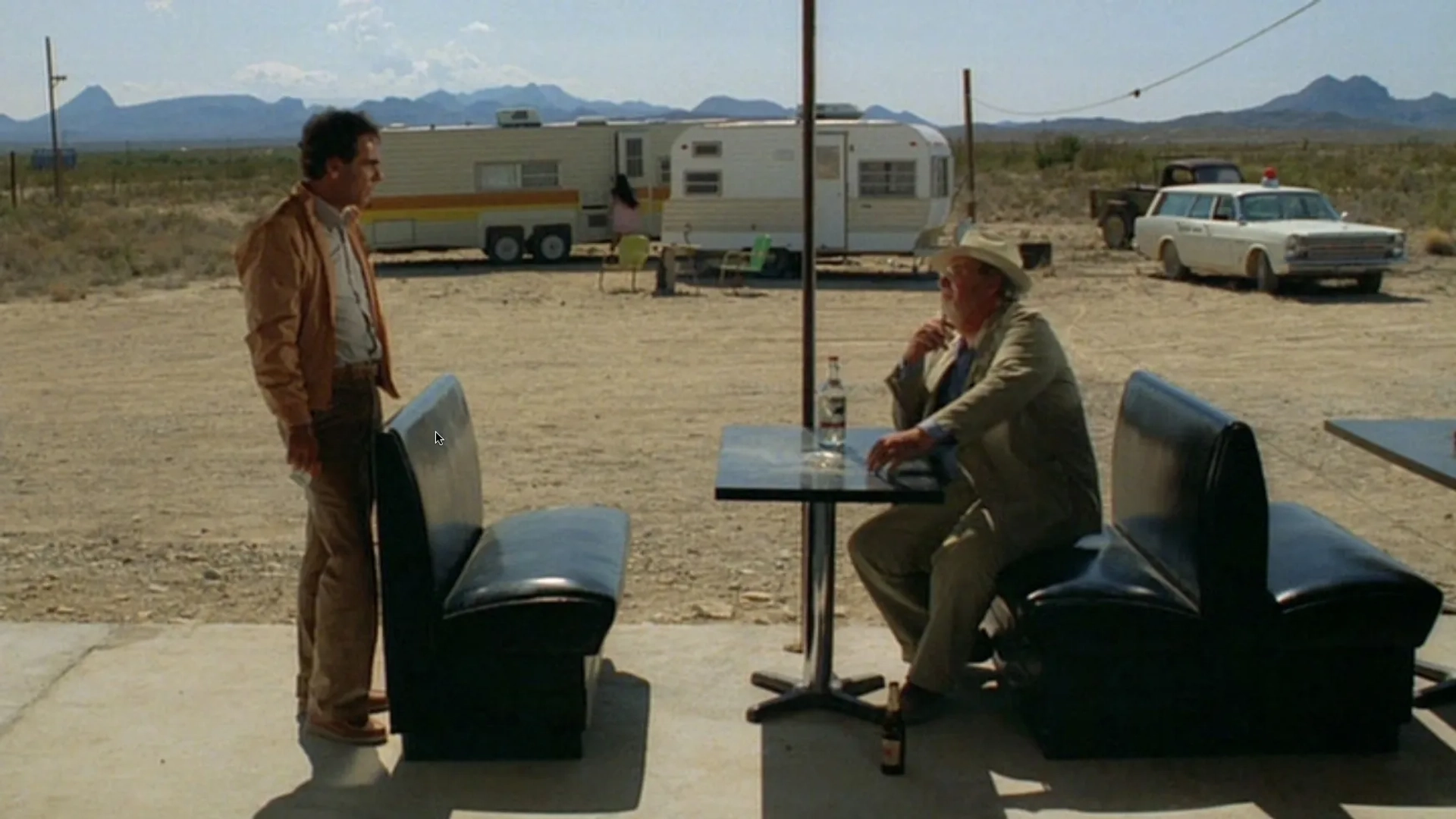 Dean Stockwell and Bernhard Wicki in Paris, Texas (1984)