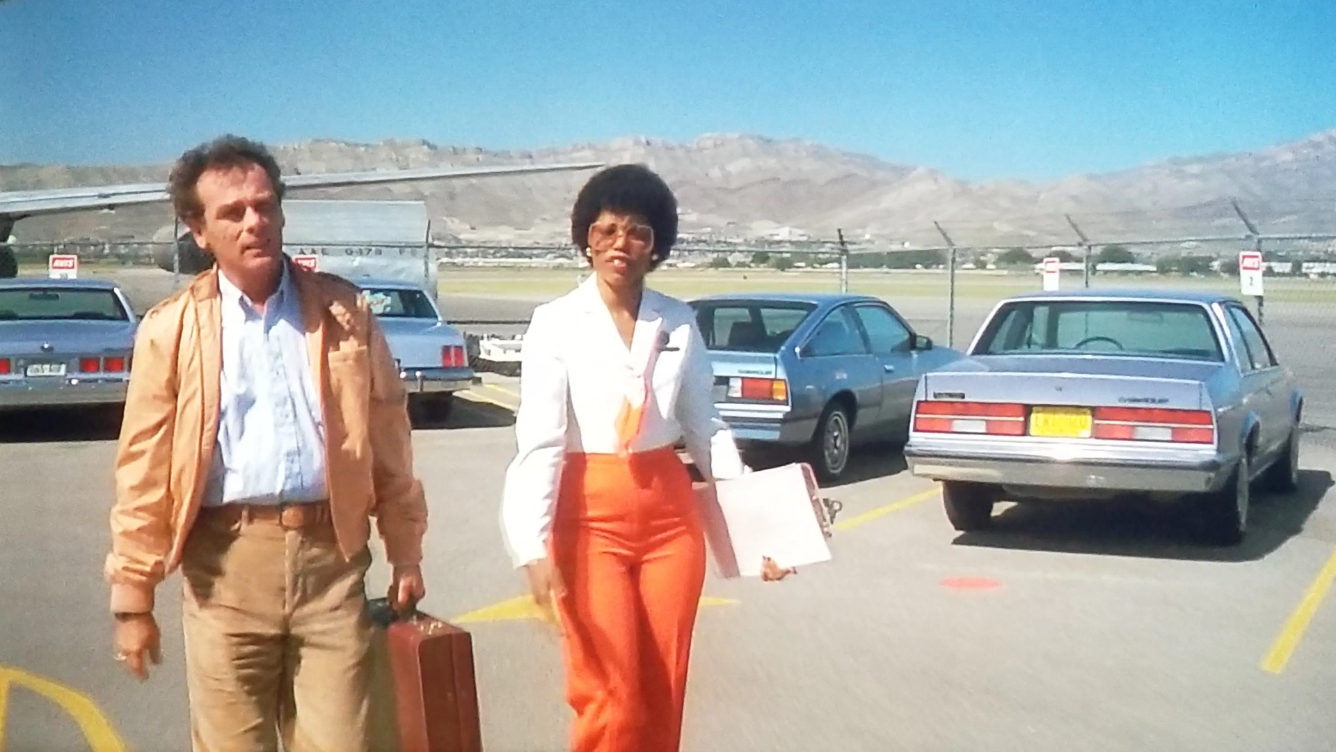 Dean Stockwell and Claresie Mobley in Paris, Texas (1984)