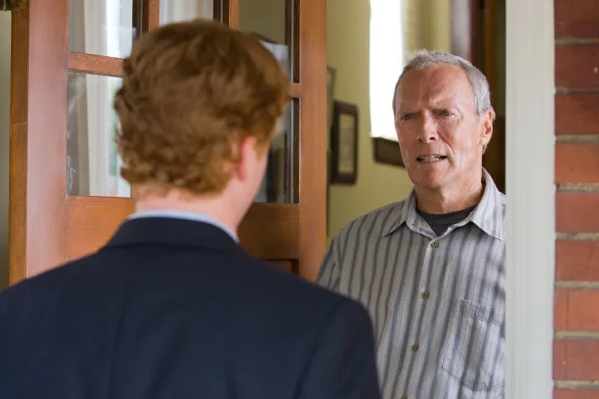 Clint Eastwood and Christopher Carley in Gran Torino (2008)