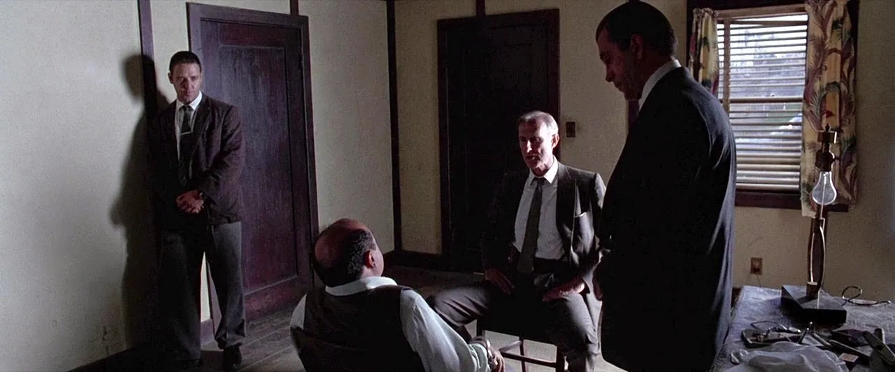 Russell Crowe, James Cromwell, and Danny DeVito in L.A. Confidential (1997)