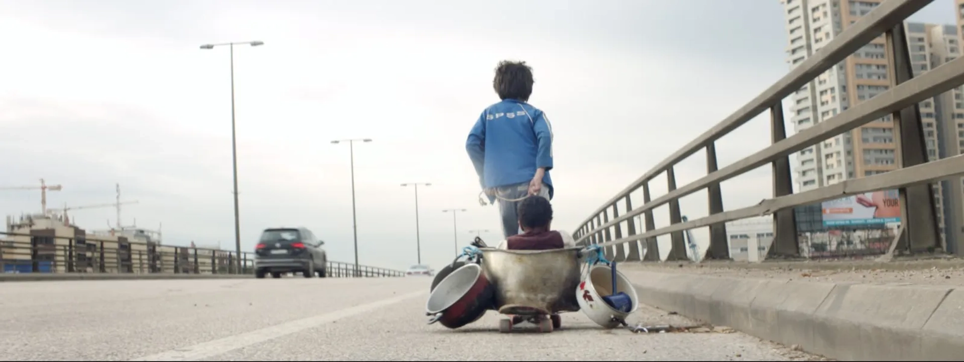 Zain Al Rafeea and Boluwatife Treasure Bankole in Capernaum (2018)