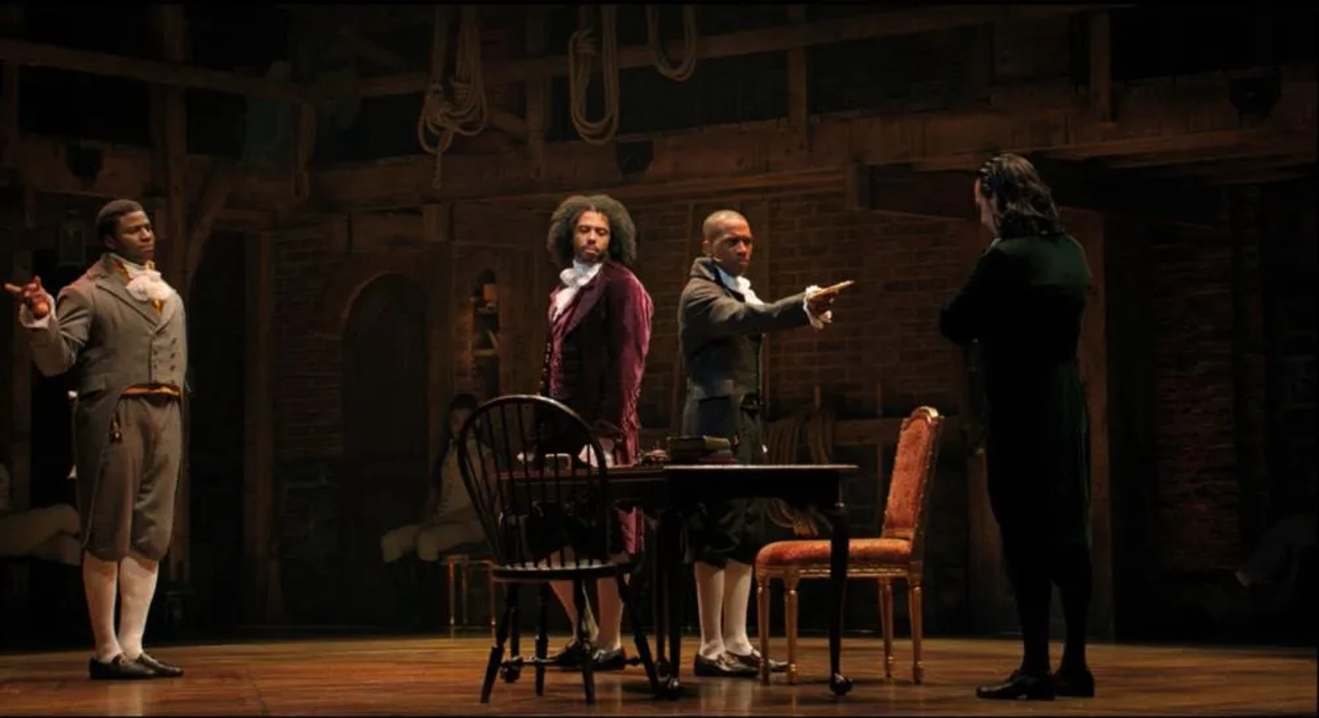 Lin-Manuel Miranda, Leslie Odom Jr., Okieriete Onaodowan, and Daveed Diggs in Hamilton (2020)