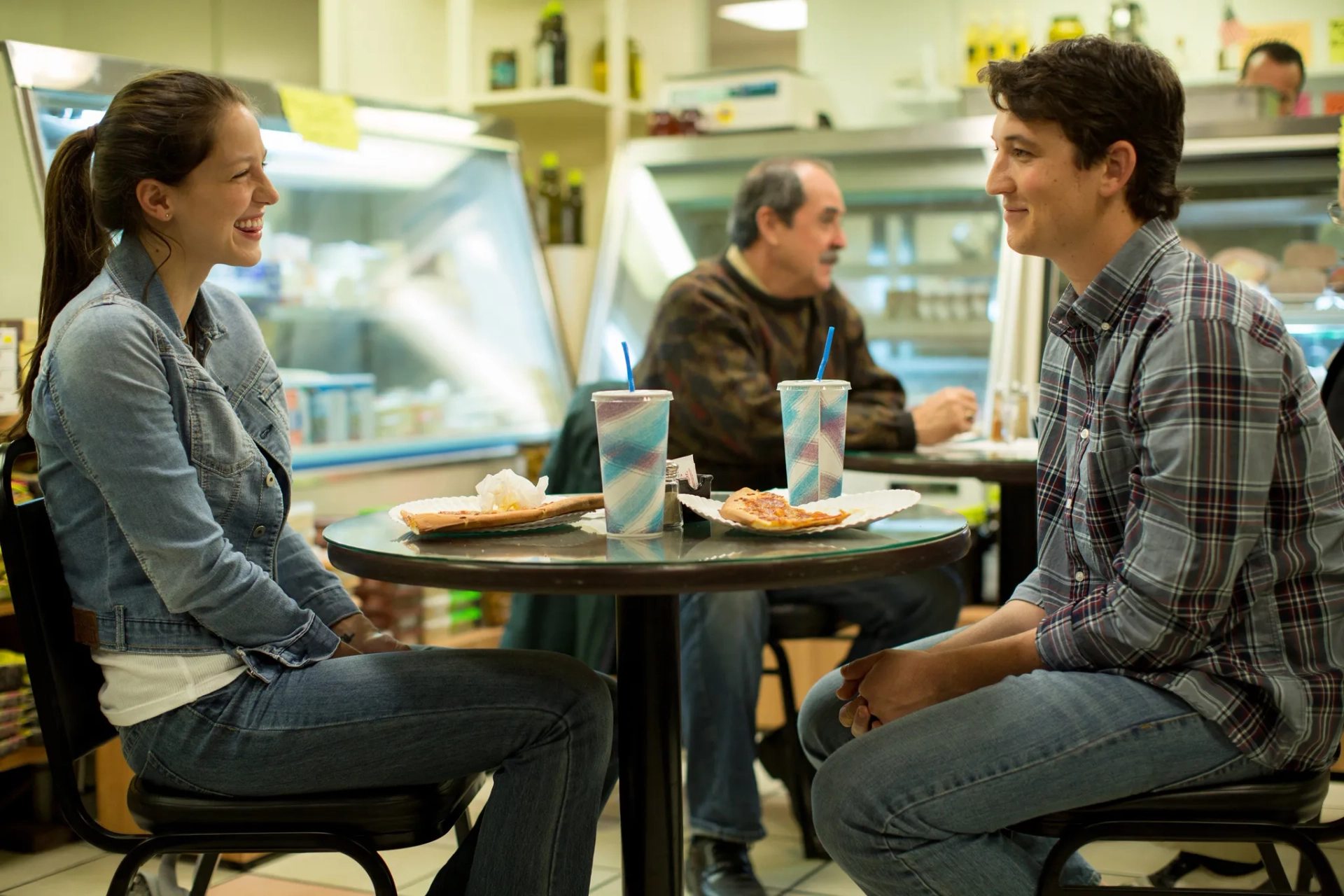 Miles Teller and Melissa Benoist in Whiplash (2014)