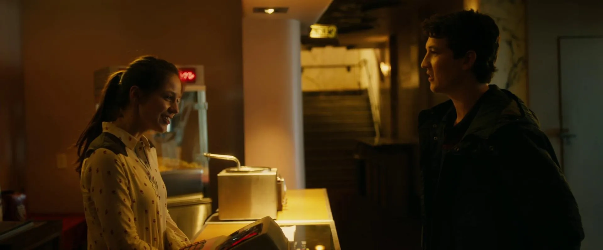 Miles Teller and Melissa Benoist in Whiplash (2014)