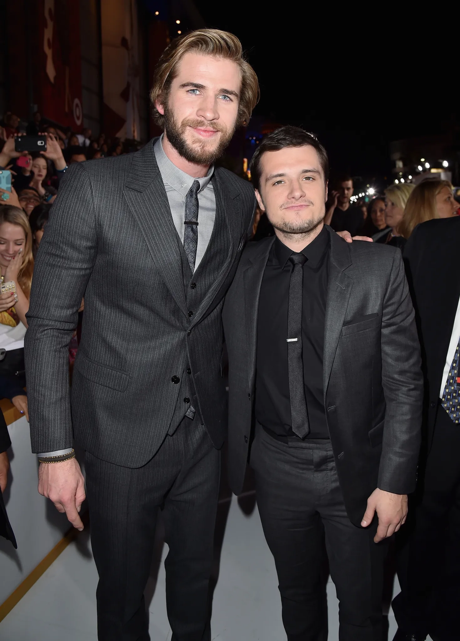 Josh Hutcherson and Liam Hemsworth at an event for The Hunger Games: Mockingjay - Part 1 (2014)