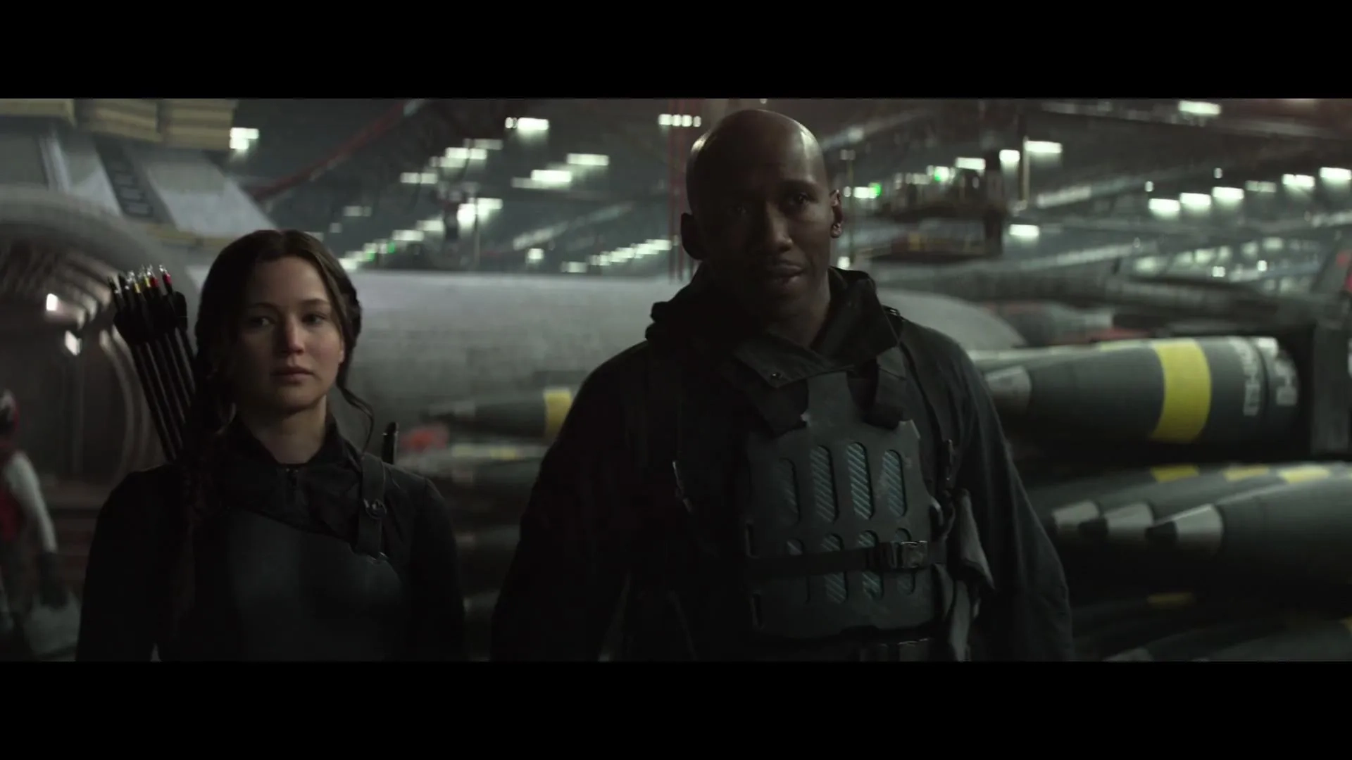 Mahershala Ali and Jennifer Lawrence in The Hunger Games: Mockingjay - Part 1 (2014)