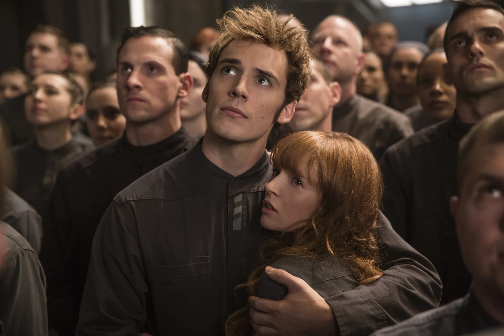 Stef Dawson and Sam Claflin in 'Mockingjay Part 1'