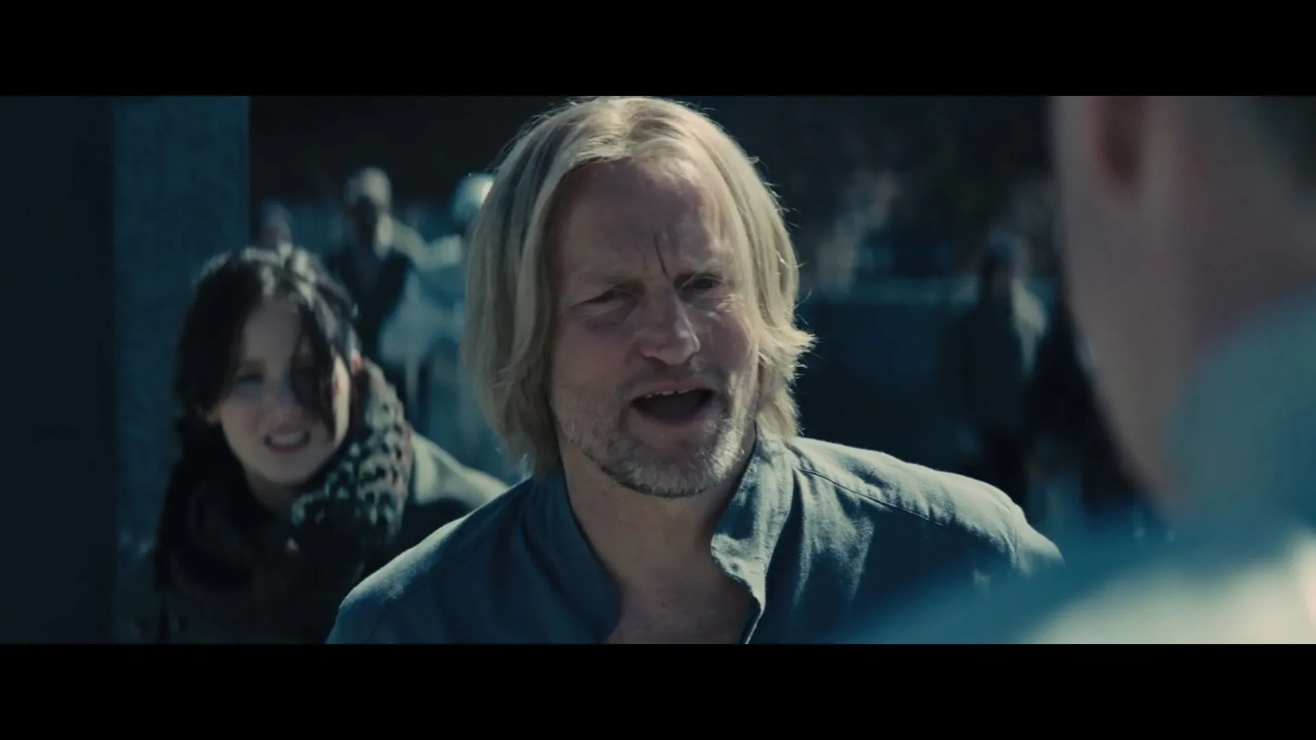 Woody Harrelson, Patrick St. Esprit, and Jennifer Lawrence in The Hunger Games: Catching Fire (2013)