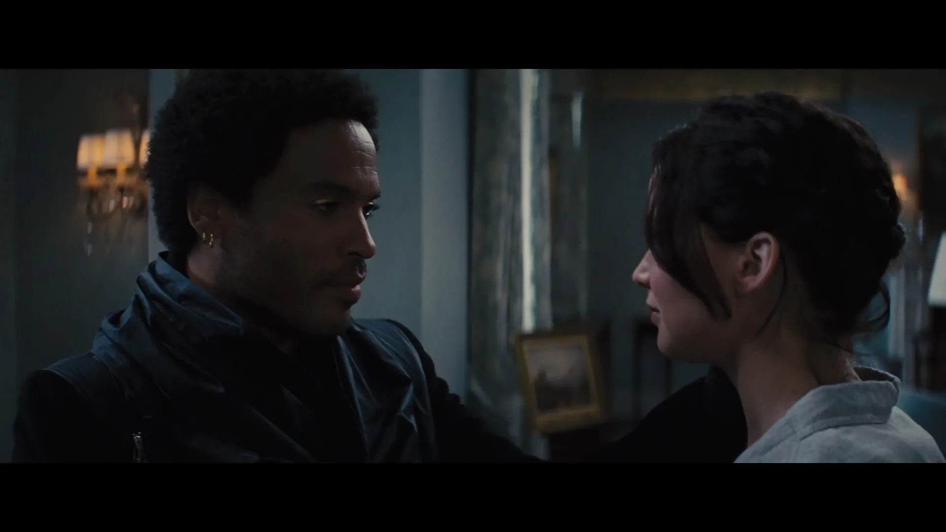 Lenny Kravitz and Jennifer Lawrence in The Hunger Games: Catching Fire (2013)