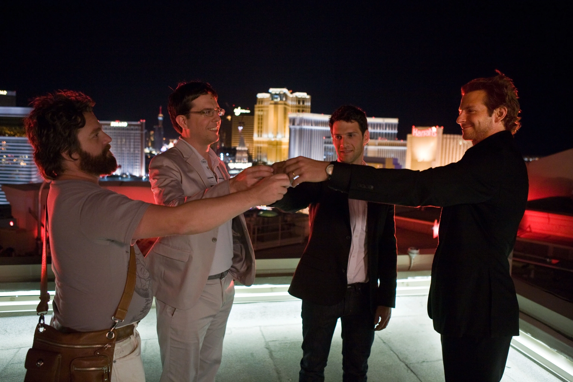 Justin Bartha, Bradley Cooper, Zach Galifianakis, and Ed Helms in The Hangover (2009)