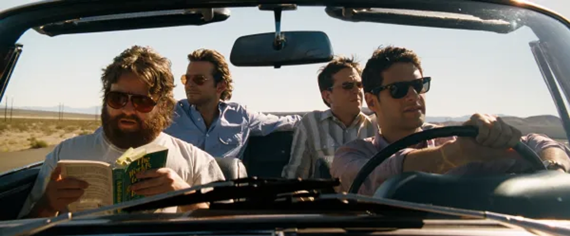 Justin Bartha, Bradley Cooper, Zach Galifianakis, and Ed Helms in The Hangover (2009)