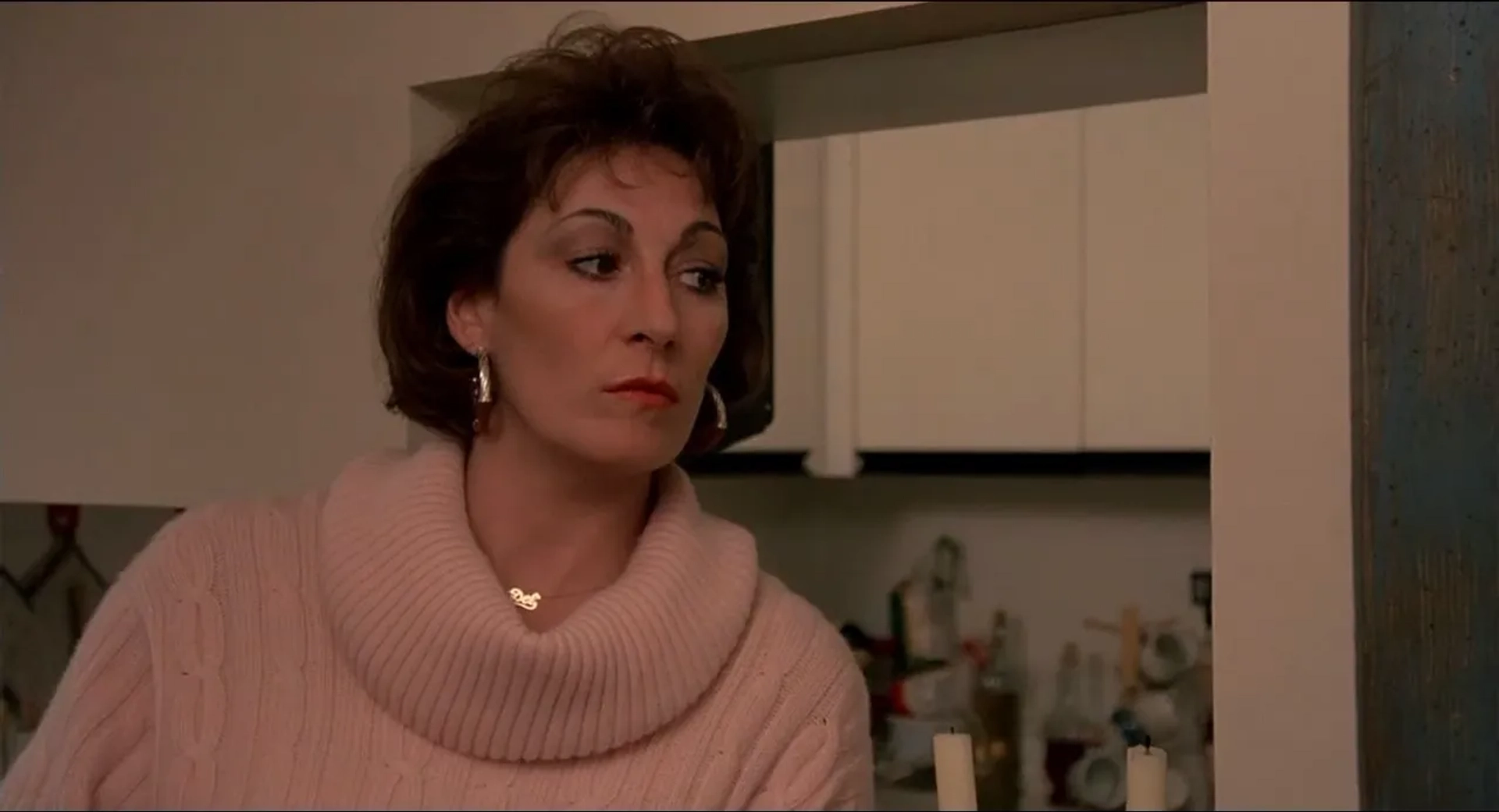 Anjelica Huston in Crimes and Misdemeanors (1989)