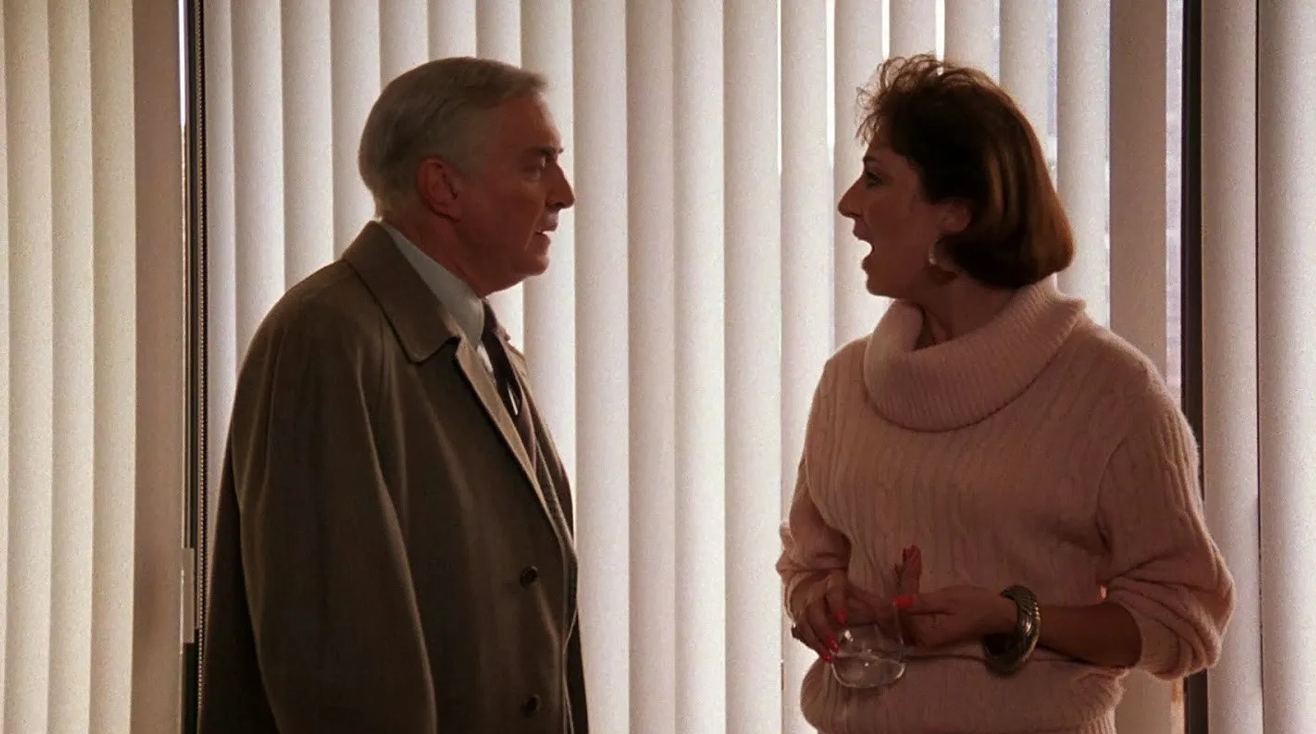 Anjelica Huston and Martin Landau in Crimes and Misdemeanors (1989)