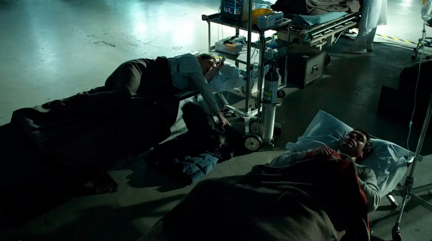 Kate Winslet and Jason Babinsky in Contagion (2011)