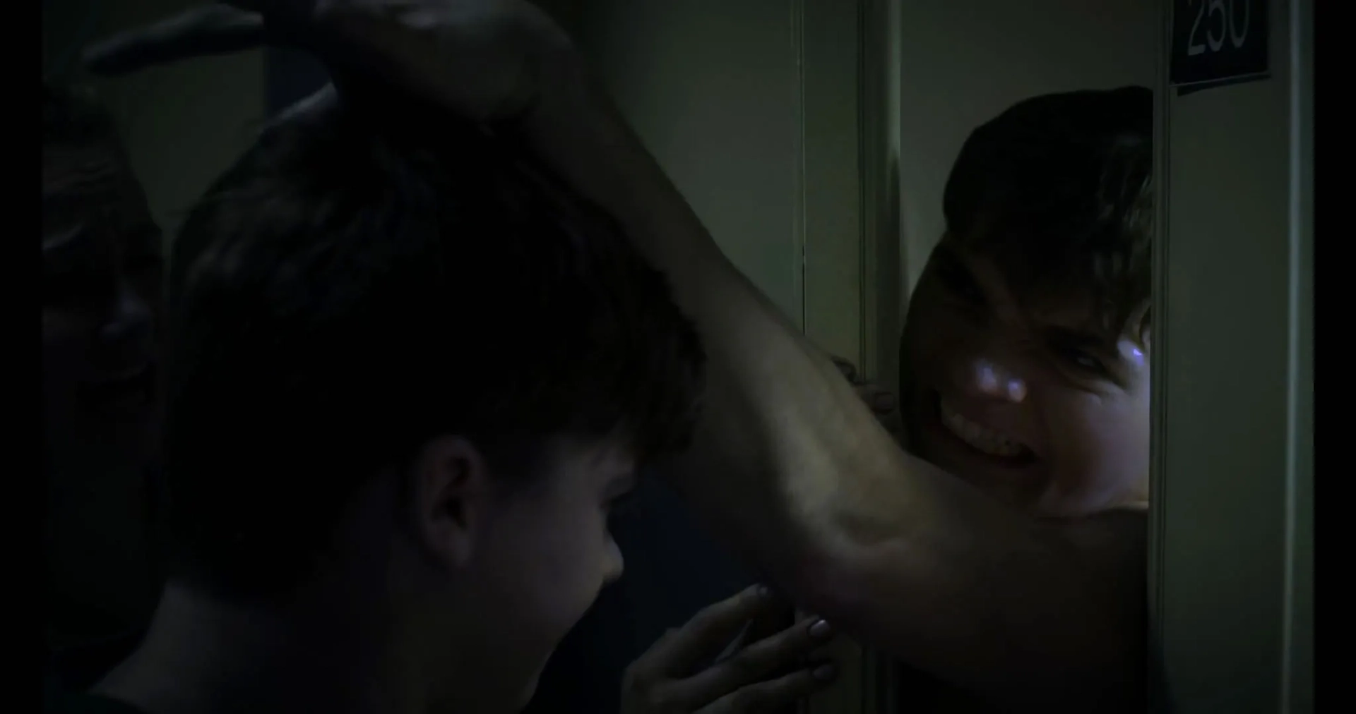 Joel Courtney in Assimilate (2019)