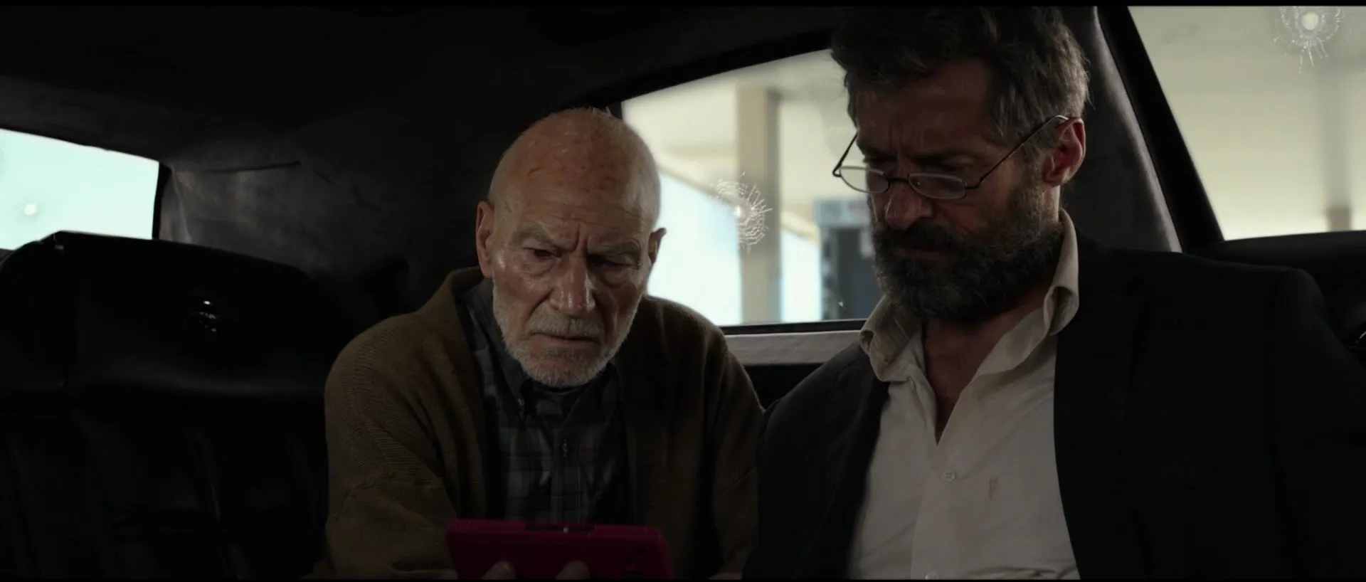 Patrick Stewart and Hugh Jackman in Logan (2017)