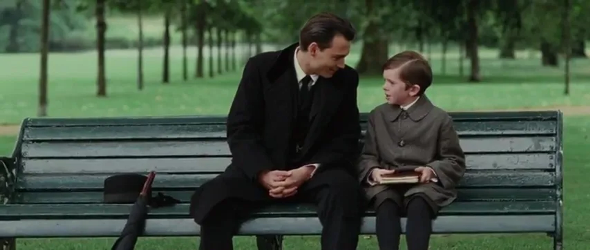 Johnny Depp and Freddie Highmore in Finding Neverland (2004)