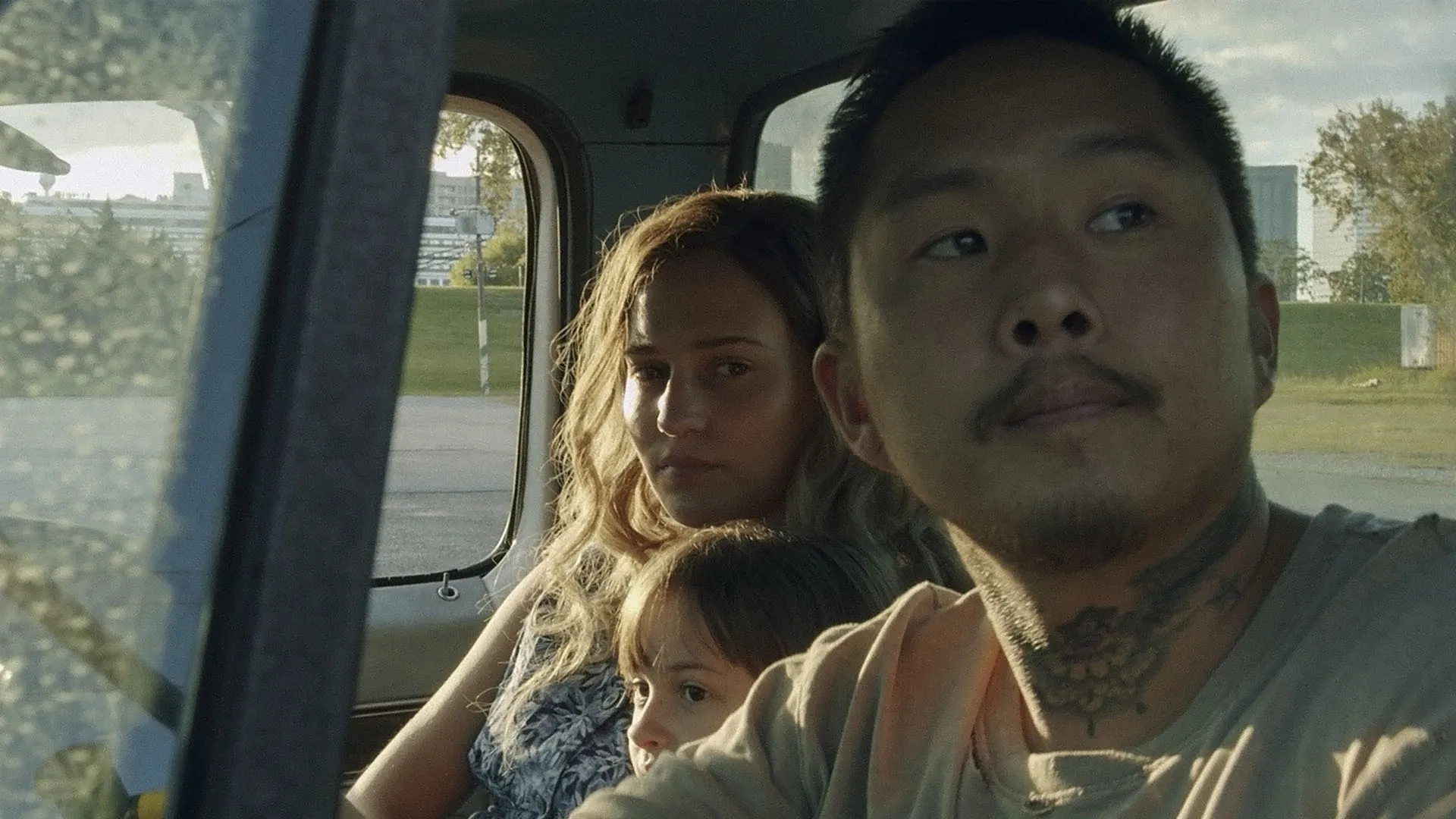 Sydney Kowalske, Justin Chon, and Alicia Vikander in Blue Bayou (2021)