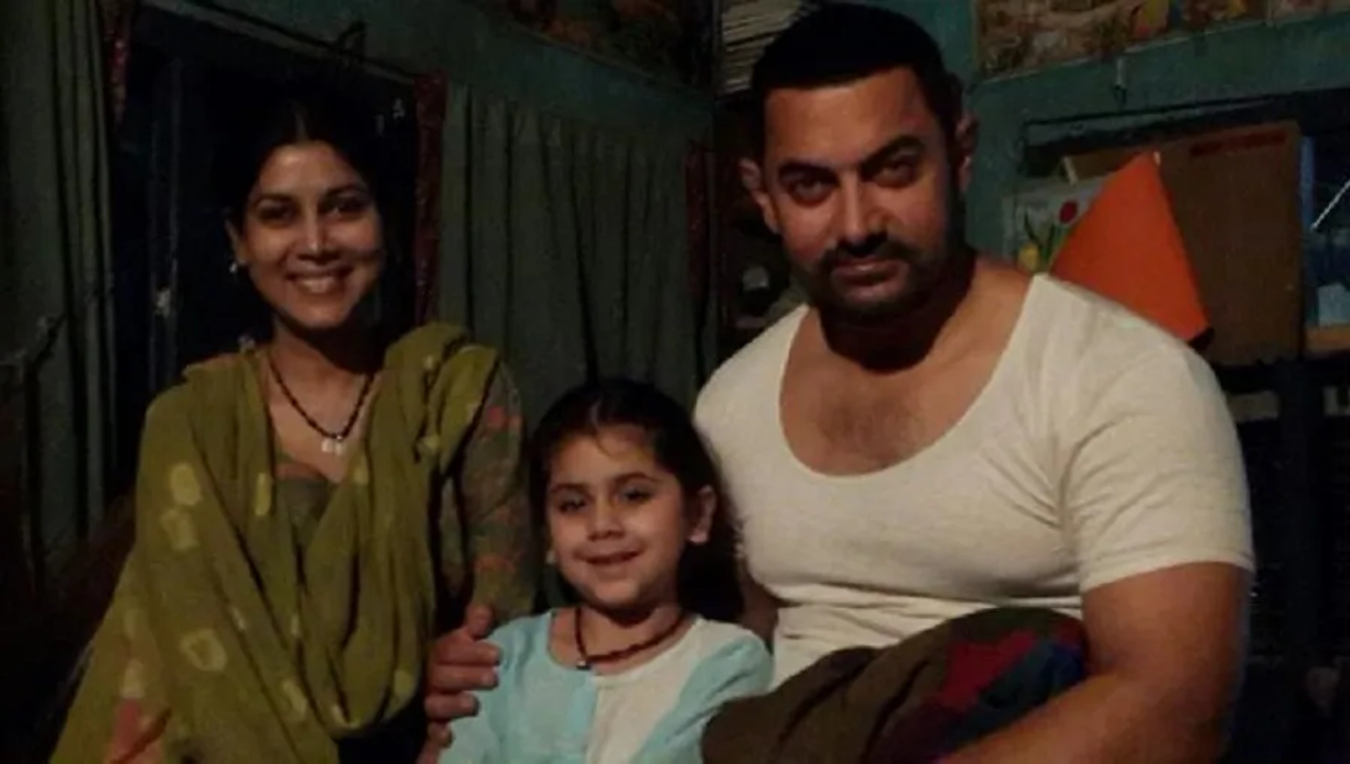 Aamir Khan and Sakshi Tanwar in Dangal (2016)