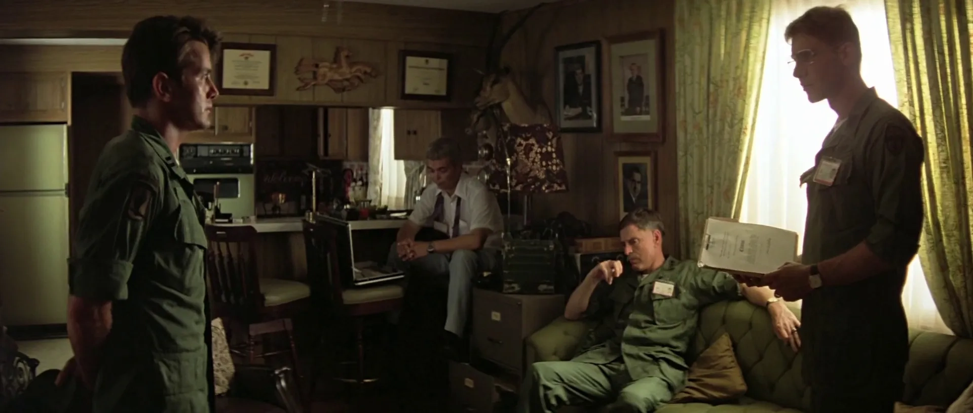 Harrison Ford, Martin Sheen, G.D. Spradlin, and Jerry Ziesmer in Apocalypse Now (1979)